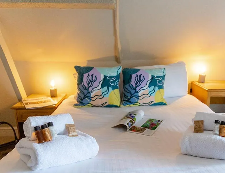 Bed in The Bell Inn Hotel