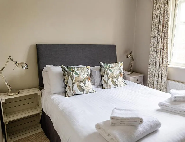 Bed in The Bell Inn Hotel