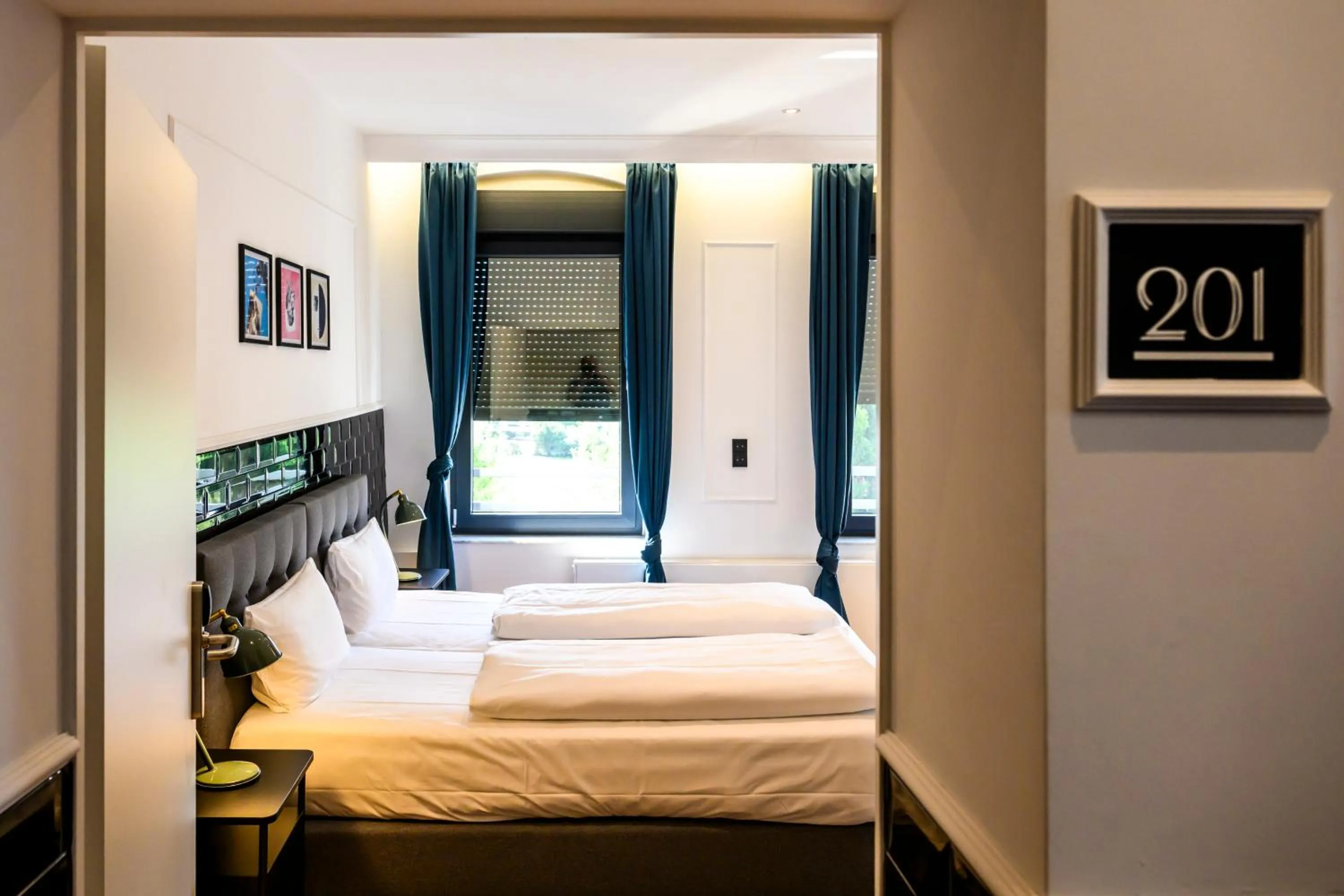 Bed in Nikii Boutique Hotel