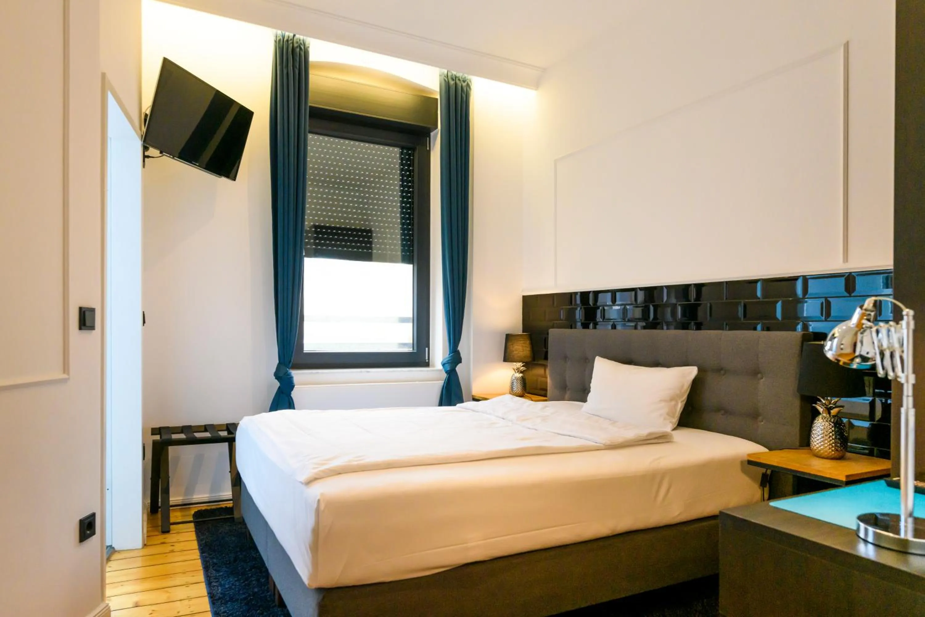 Bed in Nikii Boutique Hotel