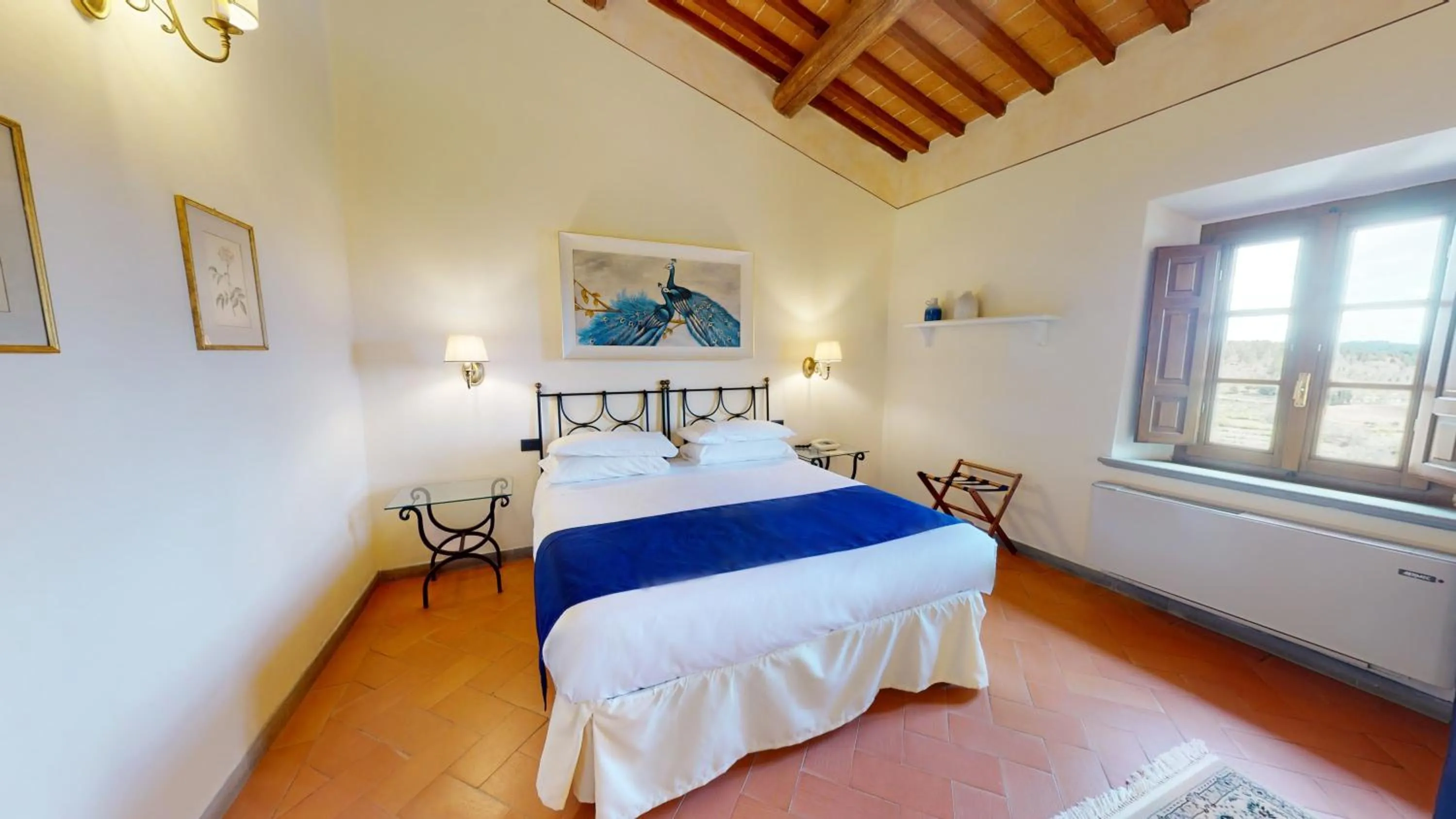 Bed in Hotel Palazzo Squarcialupi