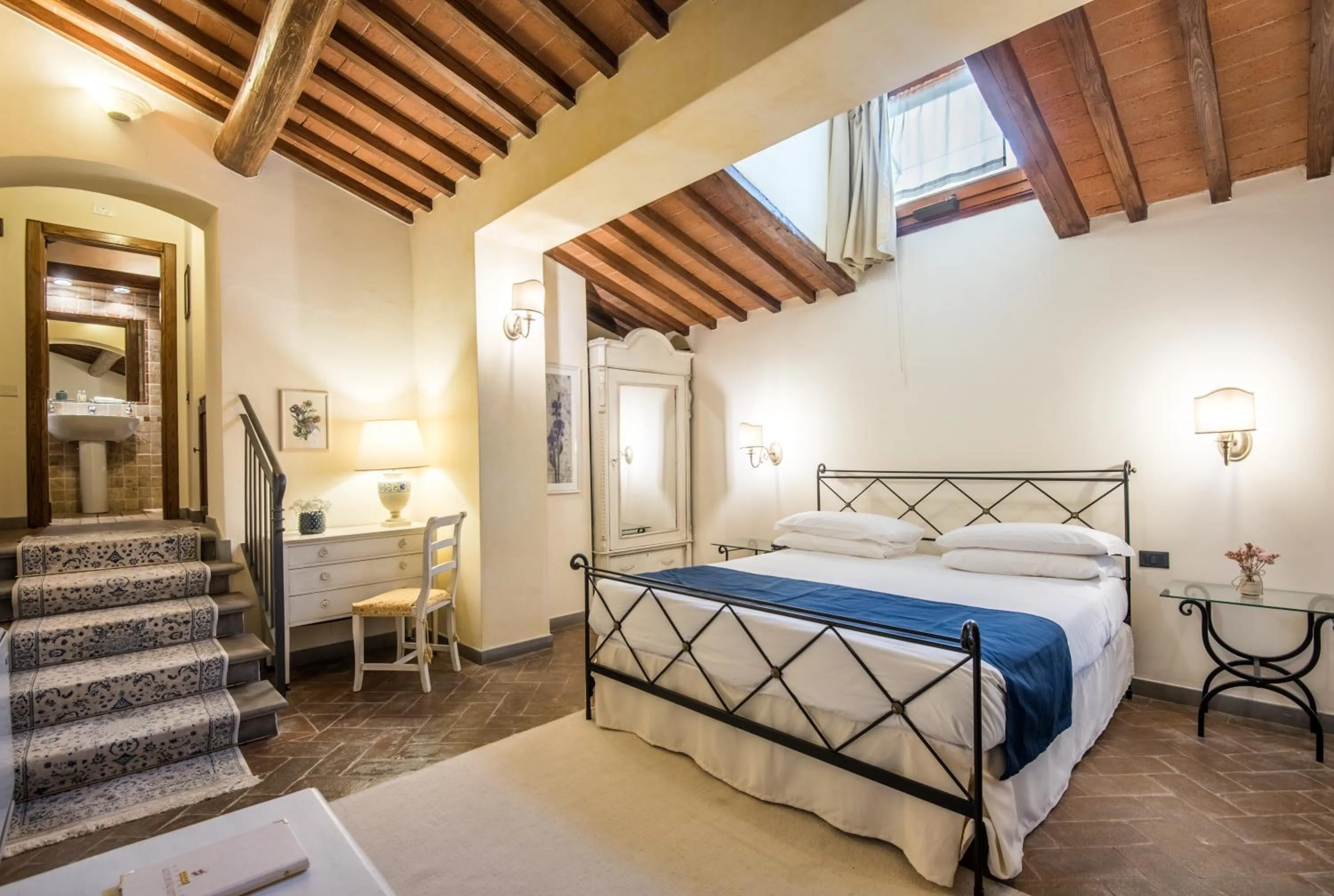 Bed in Hotel Palazzo Squarcialupi