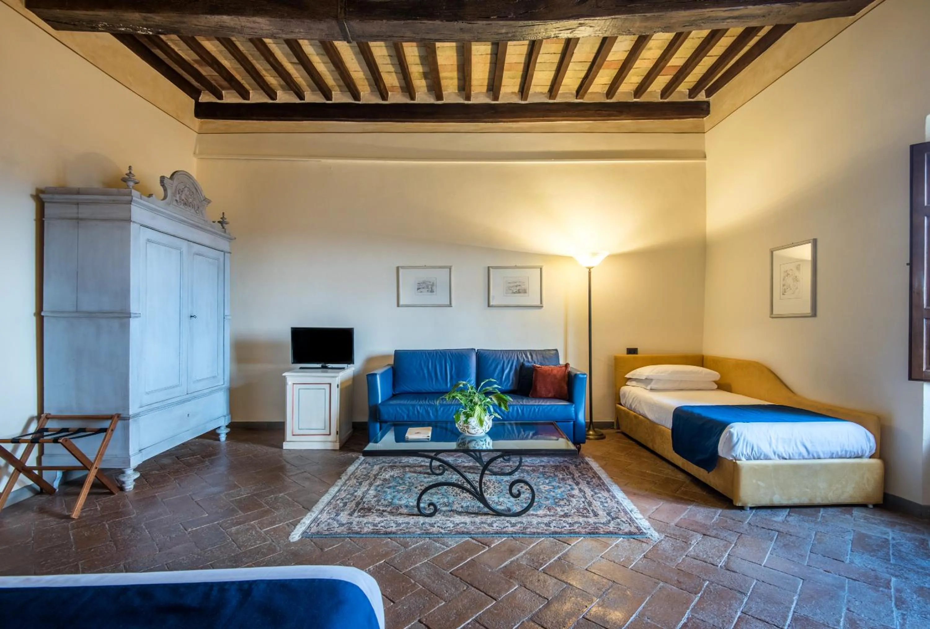 Bed in Hotel Palazzo Squarcialupi