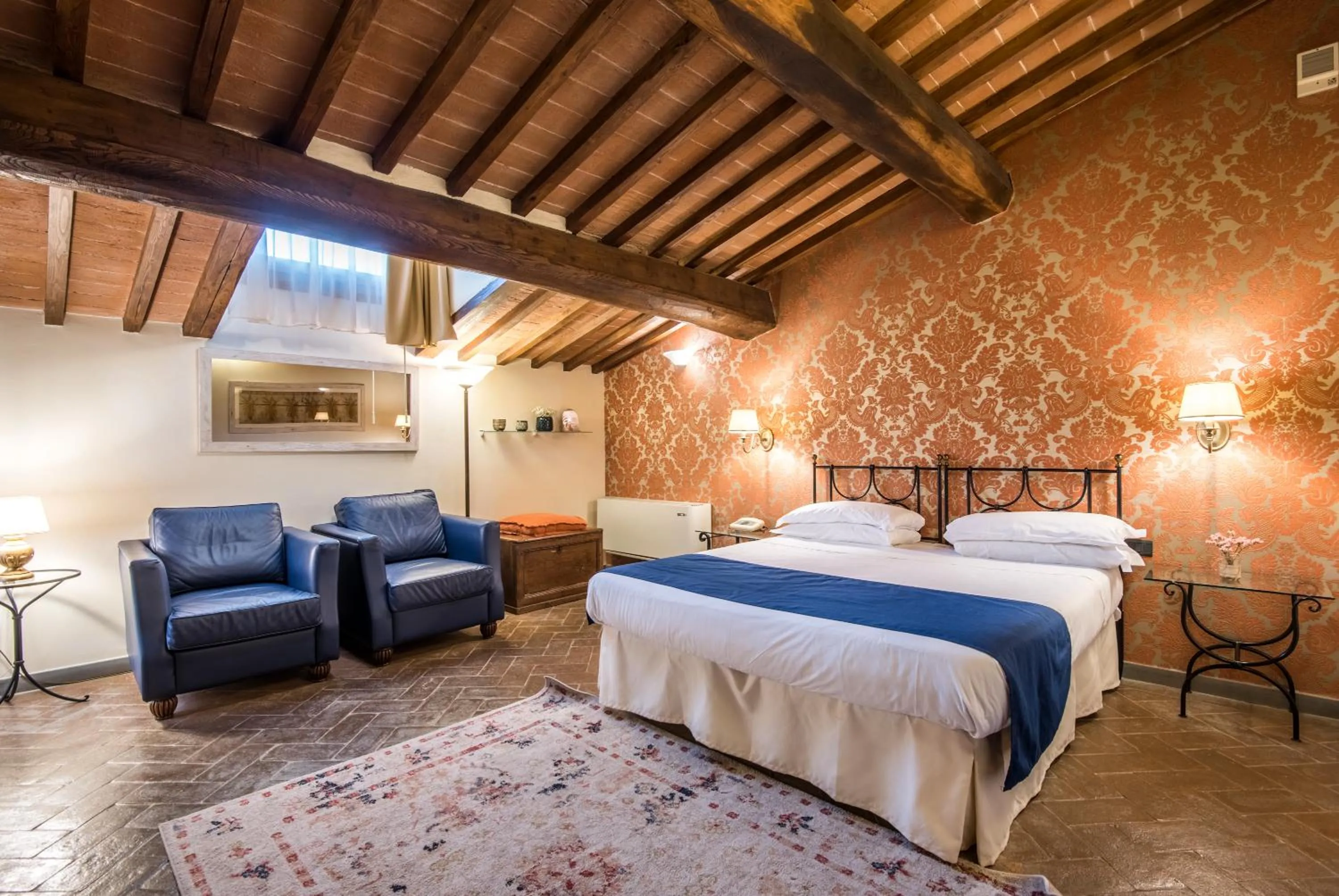 Bed in Hotel Palazzo Squarcialupi