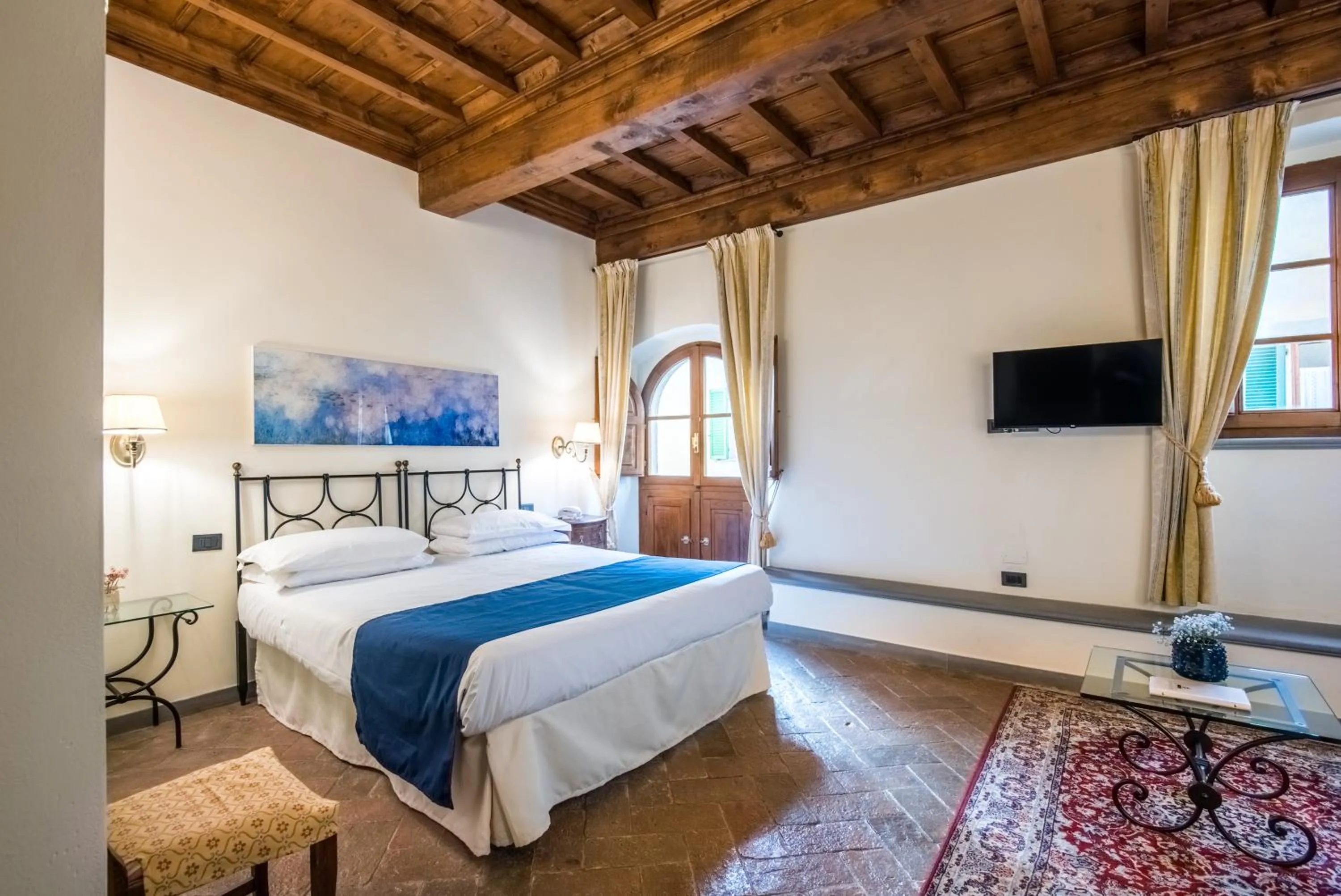 Bed in Hotel Palazzo Squarcialupi