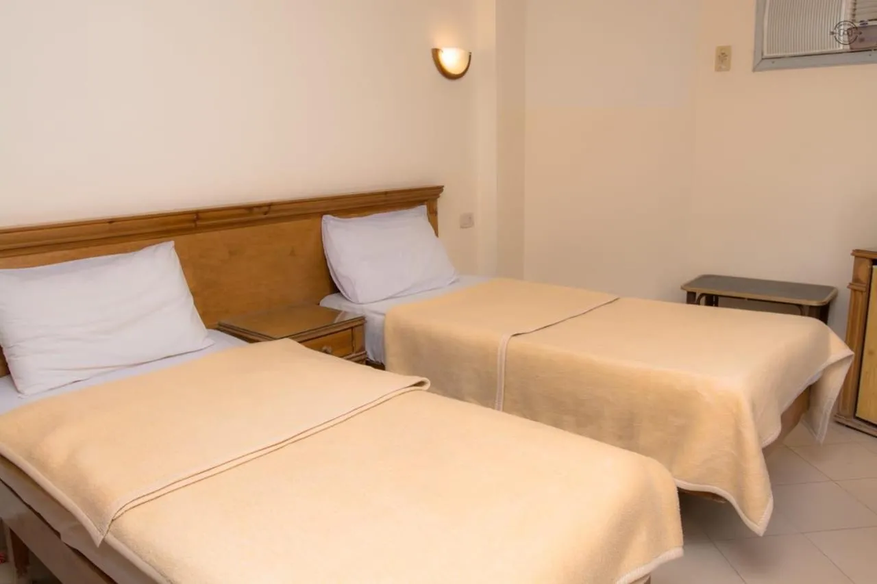 Bed in Dyarna Dahab Hotel