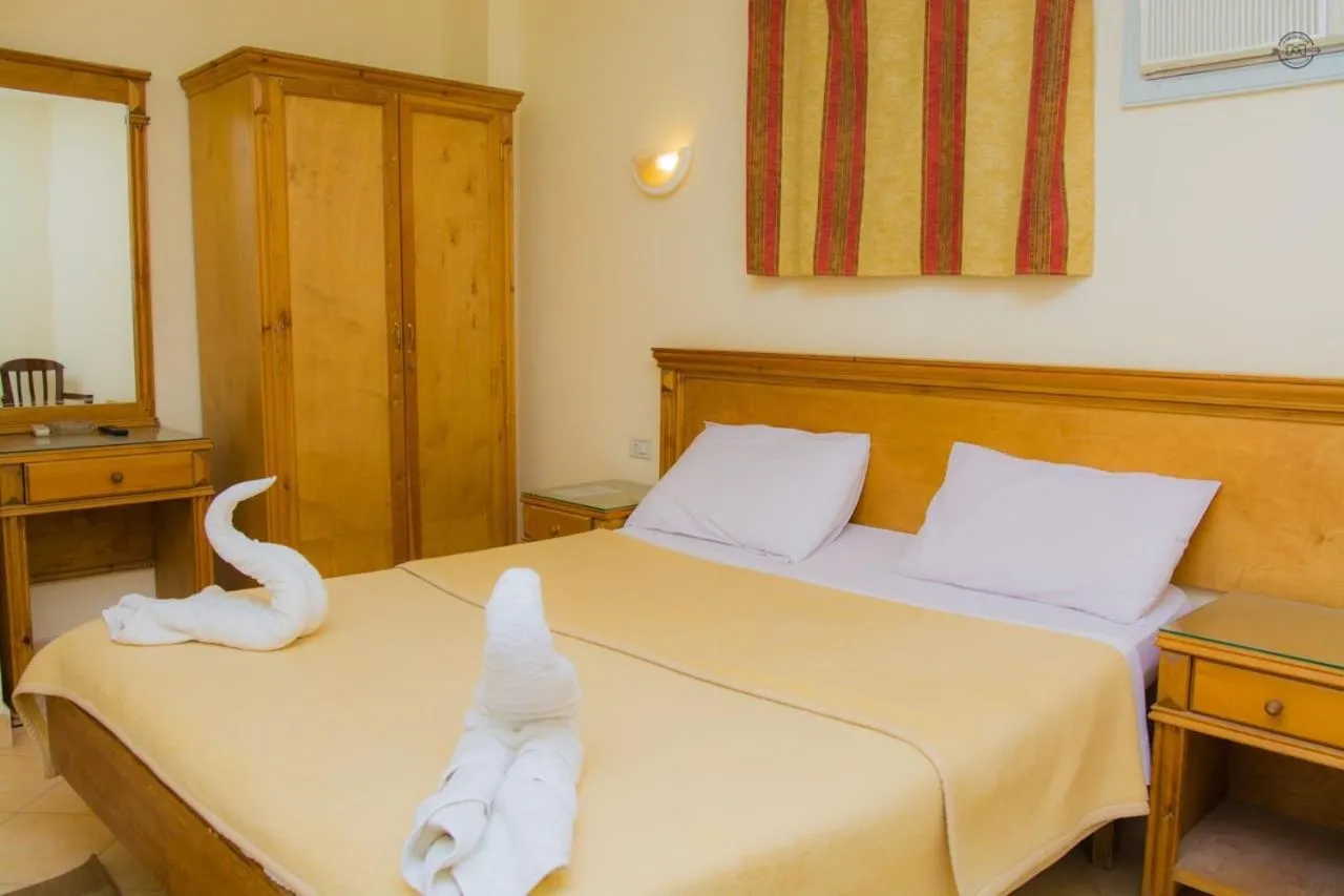 Bed in Dyarna Dahab Hotel