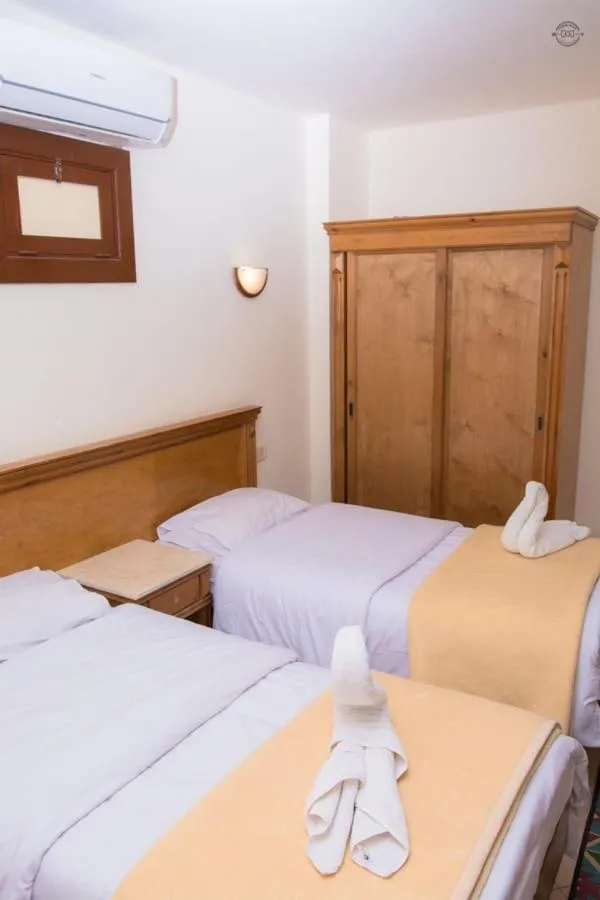 Bed in Dyarna Dahab Hotel