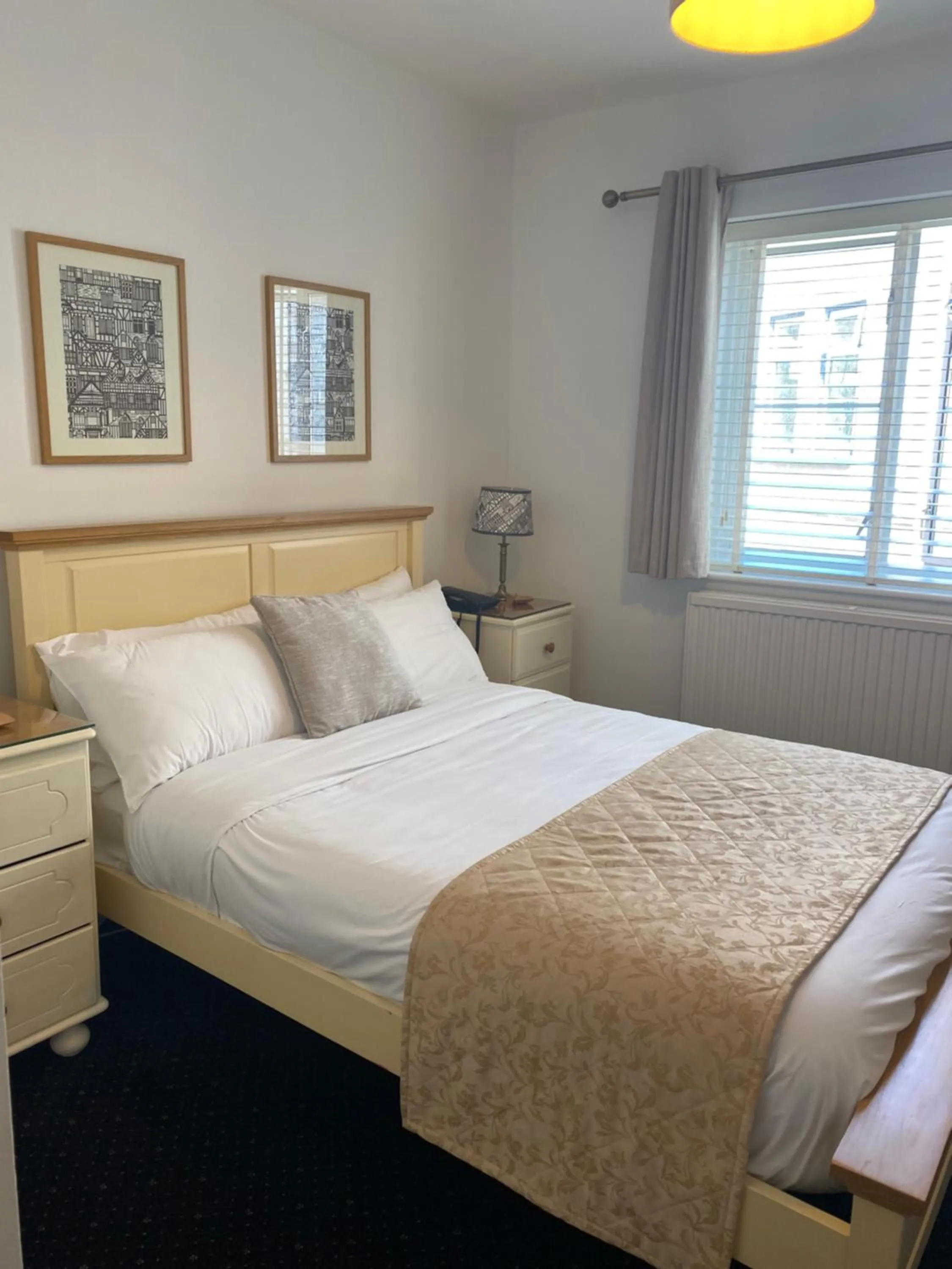 Bed in The Tudor Hotel