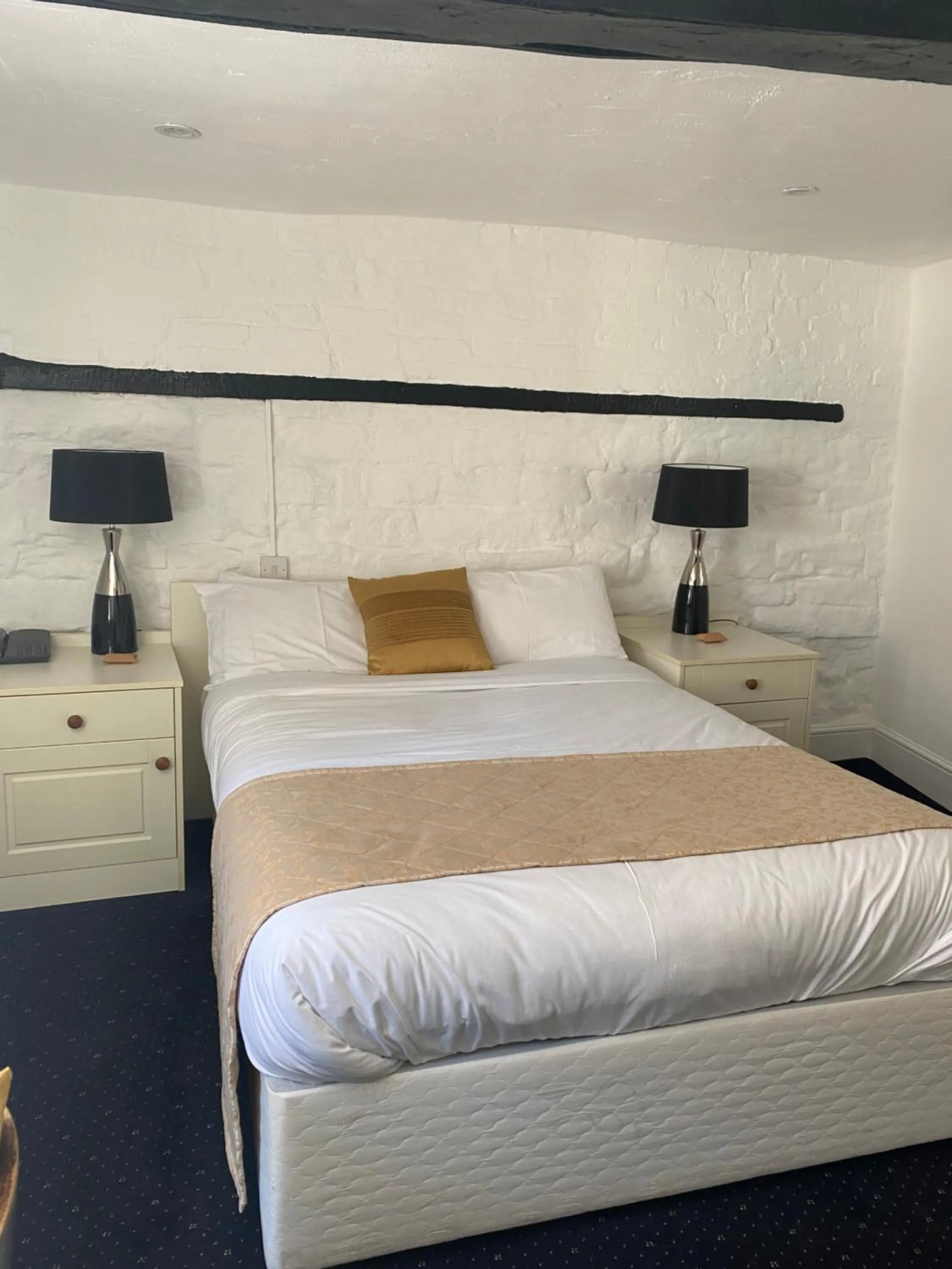 Bed in The Tudor Hotel