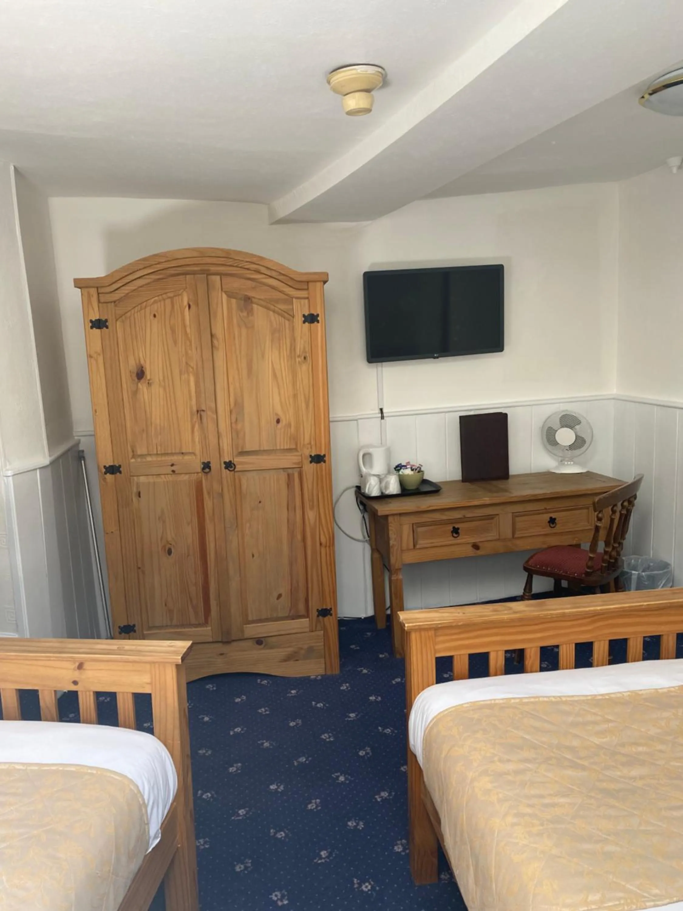 Bed in The Tudor Hotel