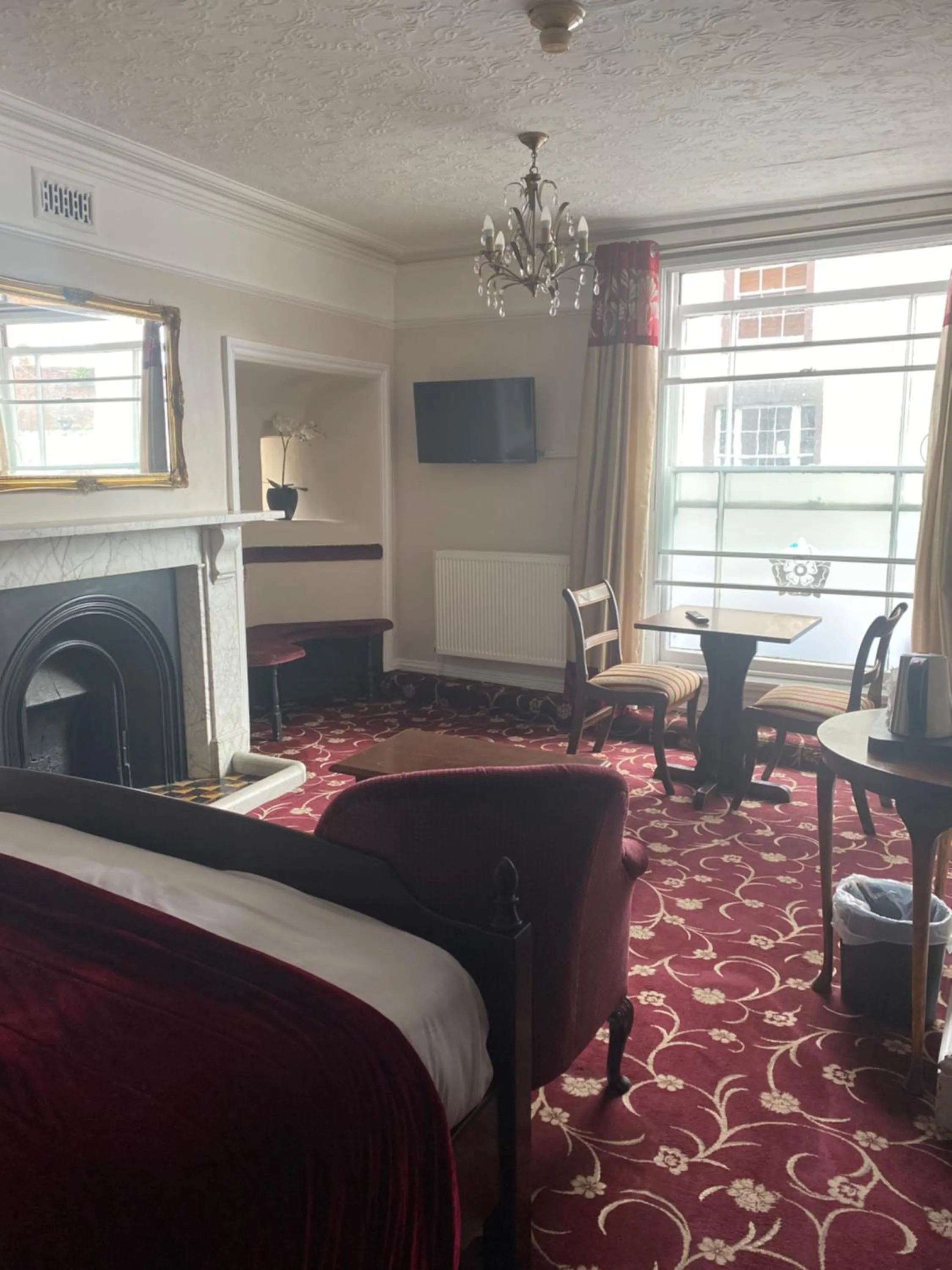 Bed in The Tudor Hotel