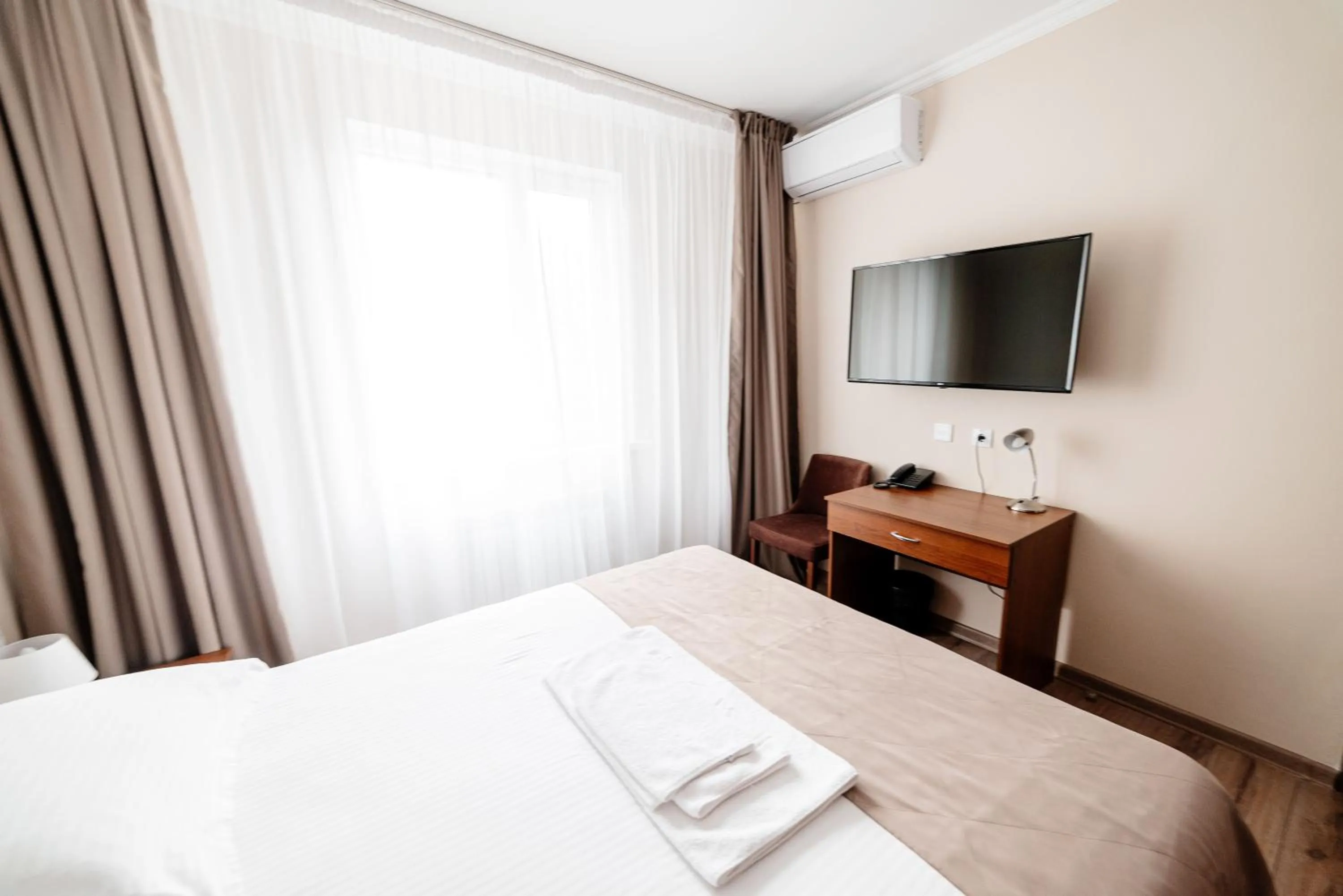 Property building, Bed in Chagala Hotel Uralsk