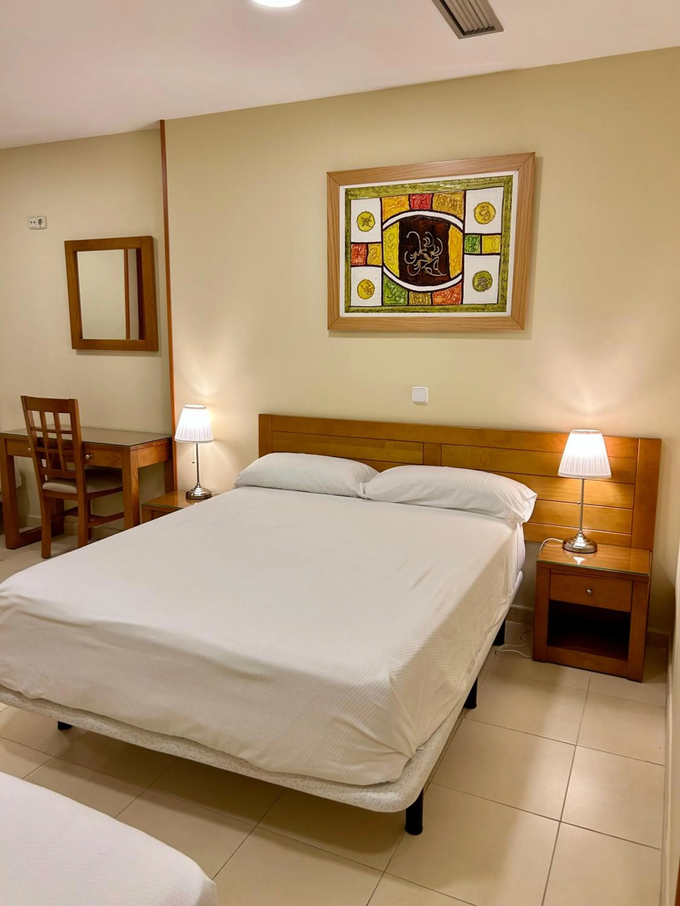 Bed in Hostal Aeropuerto