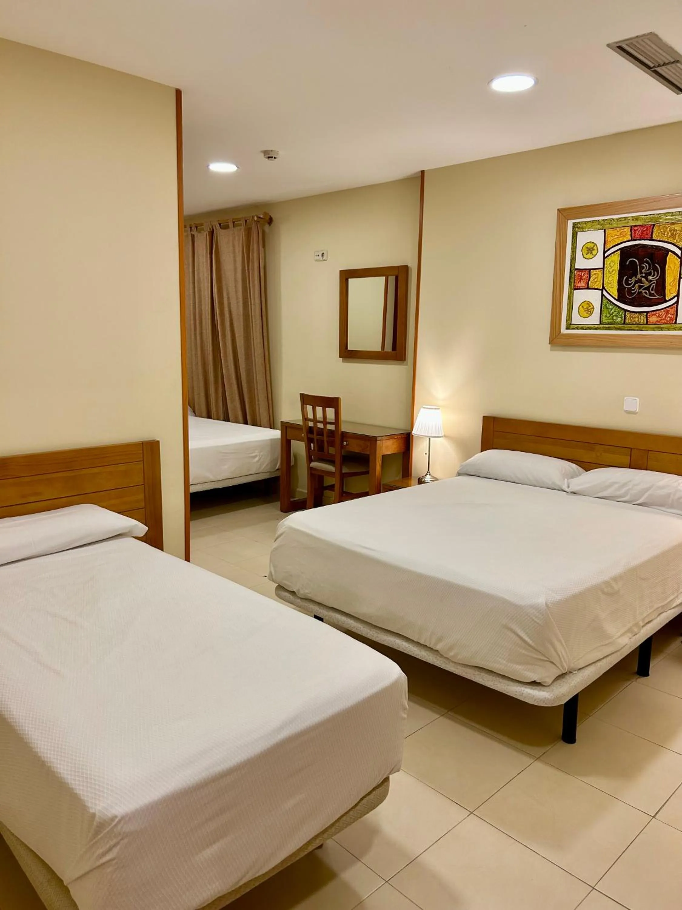 Bed in Hostal Aeropuerto