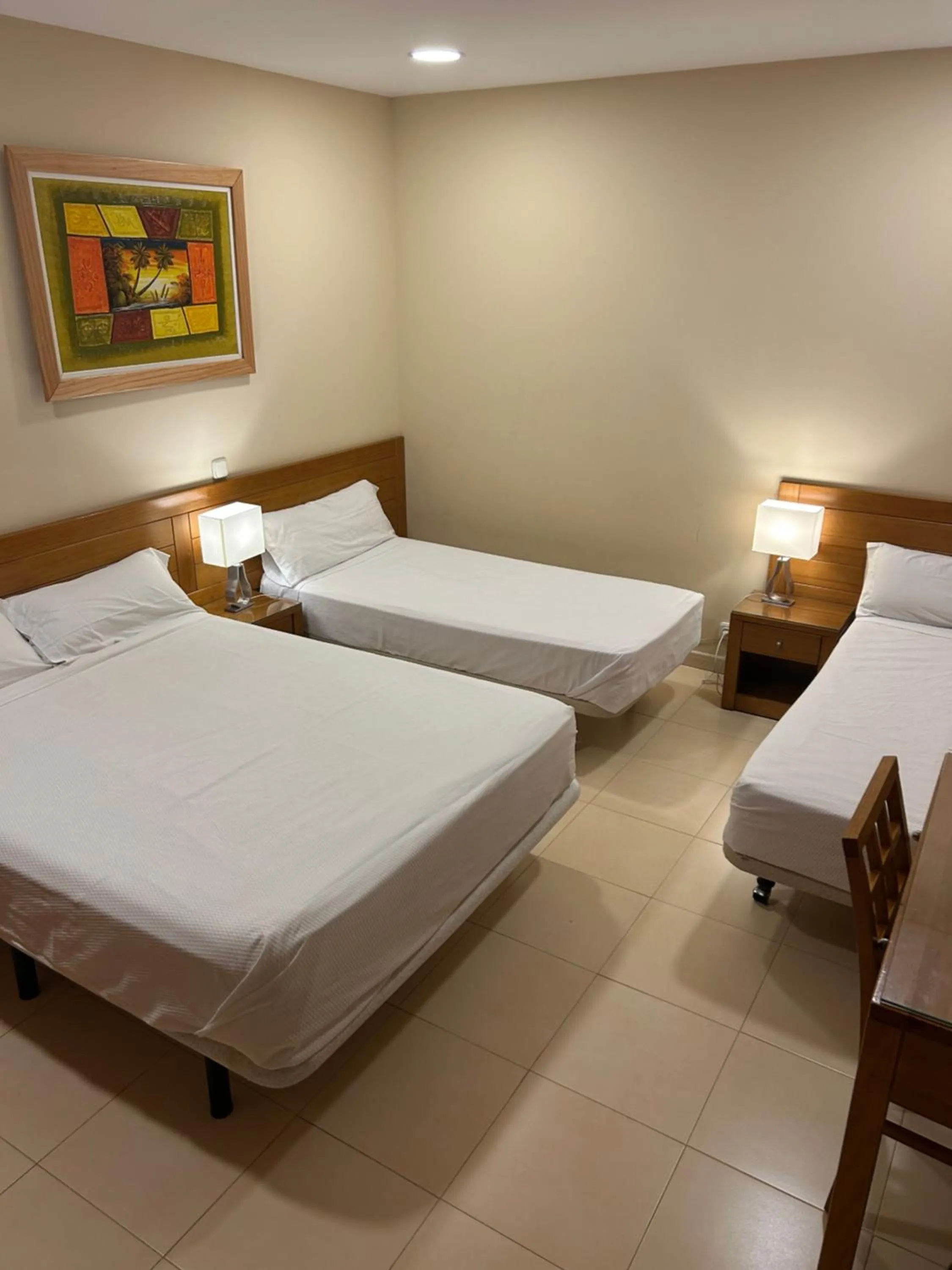 Bed in Hostal Aeropuerto