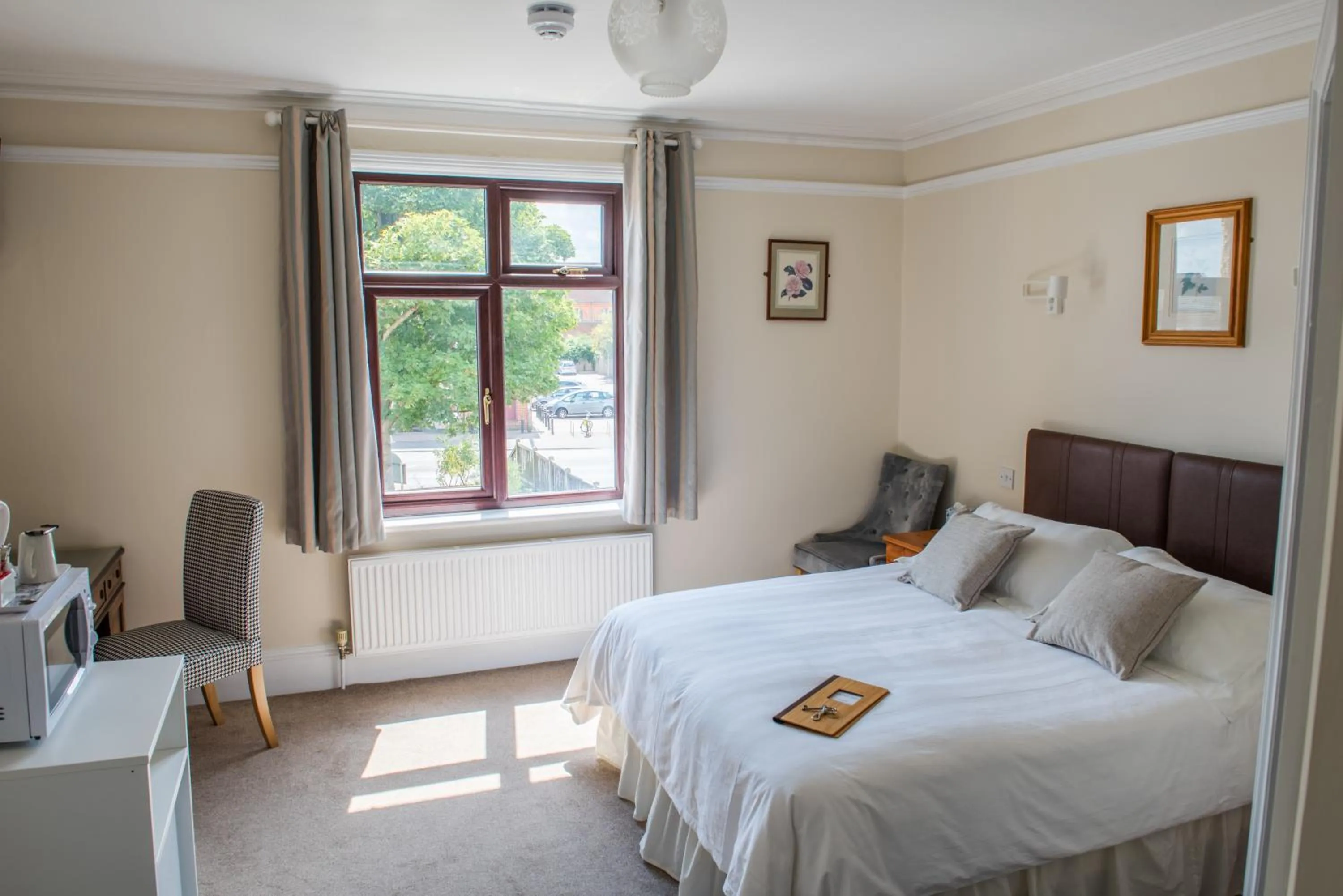 Bed in Toothbrush Rooms at Lattice Lodge - Guest Kitchen & EV Recharging