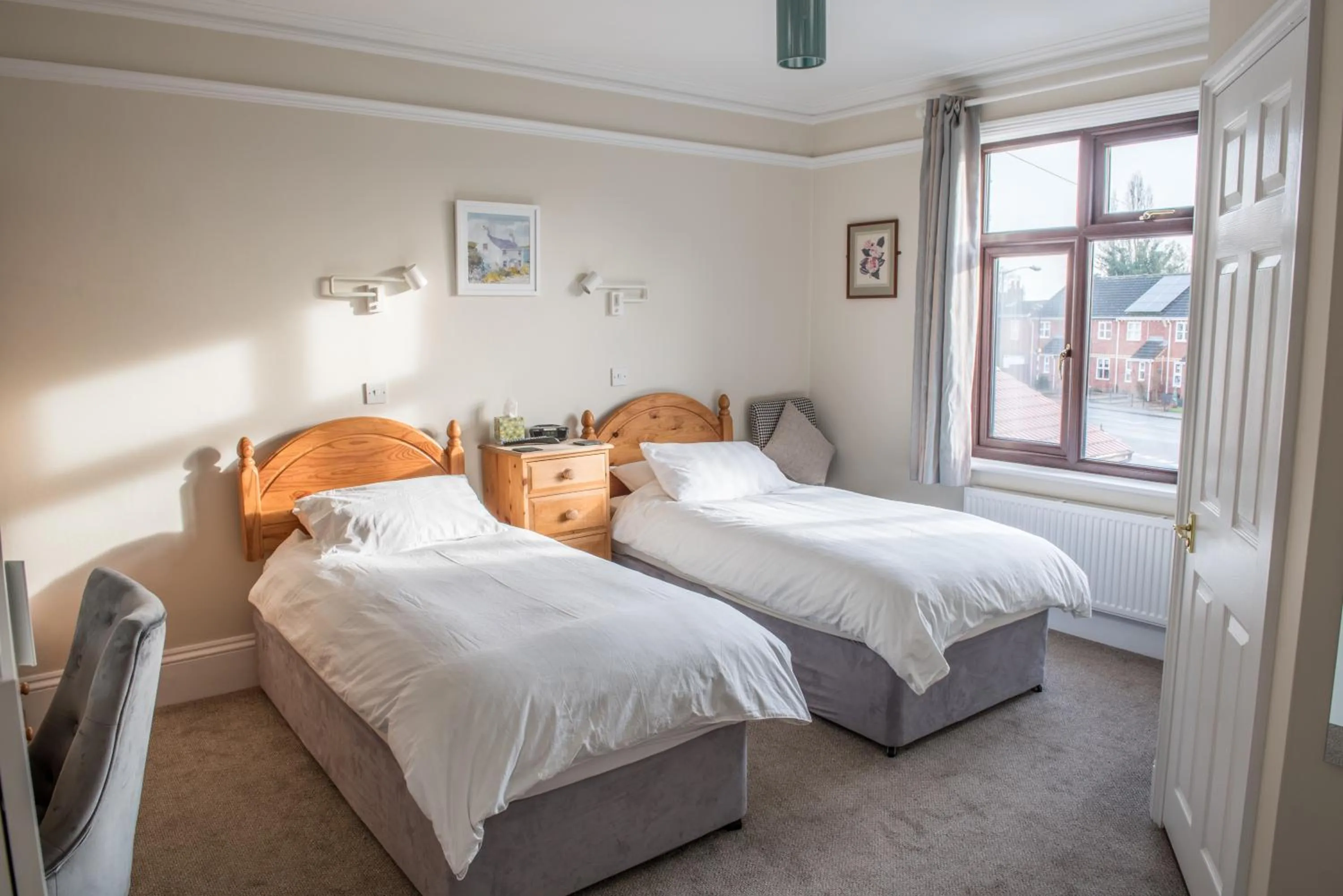 Bed in Toothbrush Rooms at Lattice Lodge - Guest Kitchen & EV Recharging