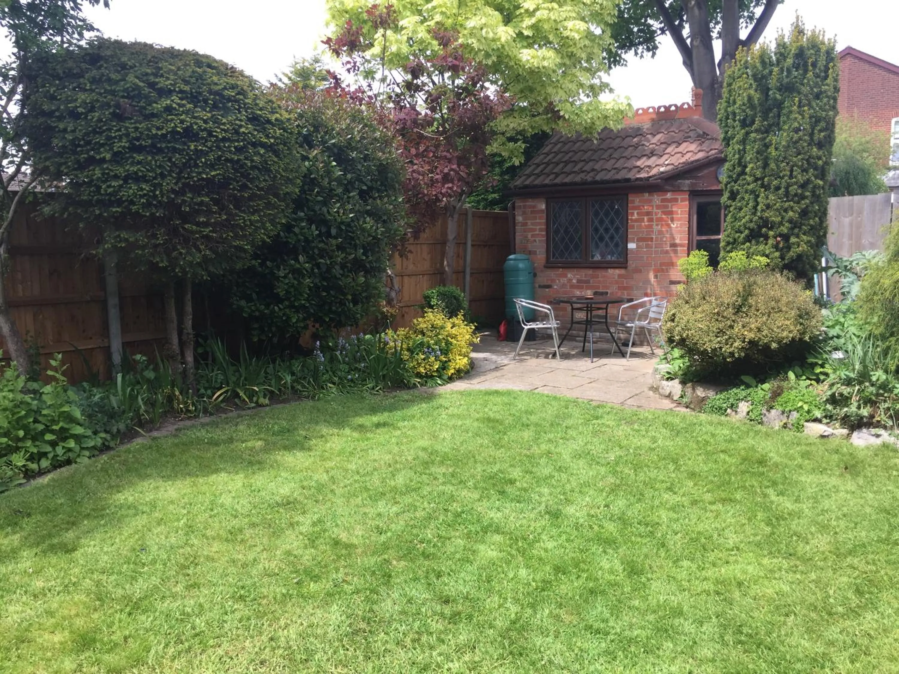 Garden in Toothbrush Rooms at Lattice Lodge - Guest Kitchen & EV Recharging