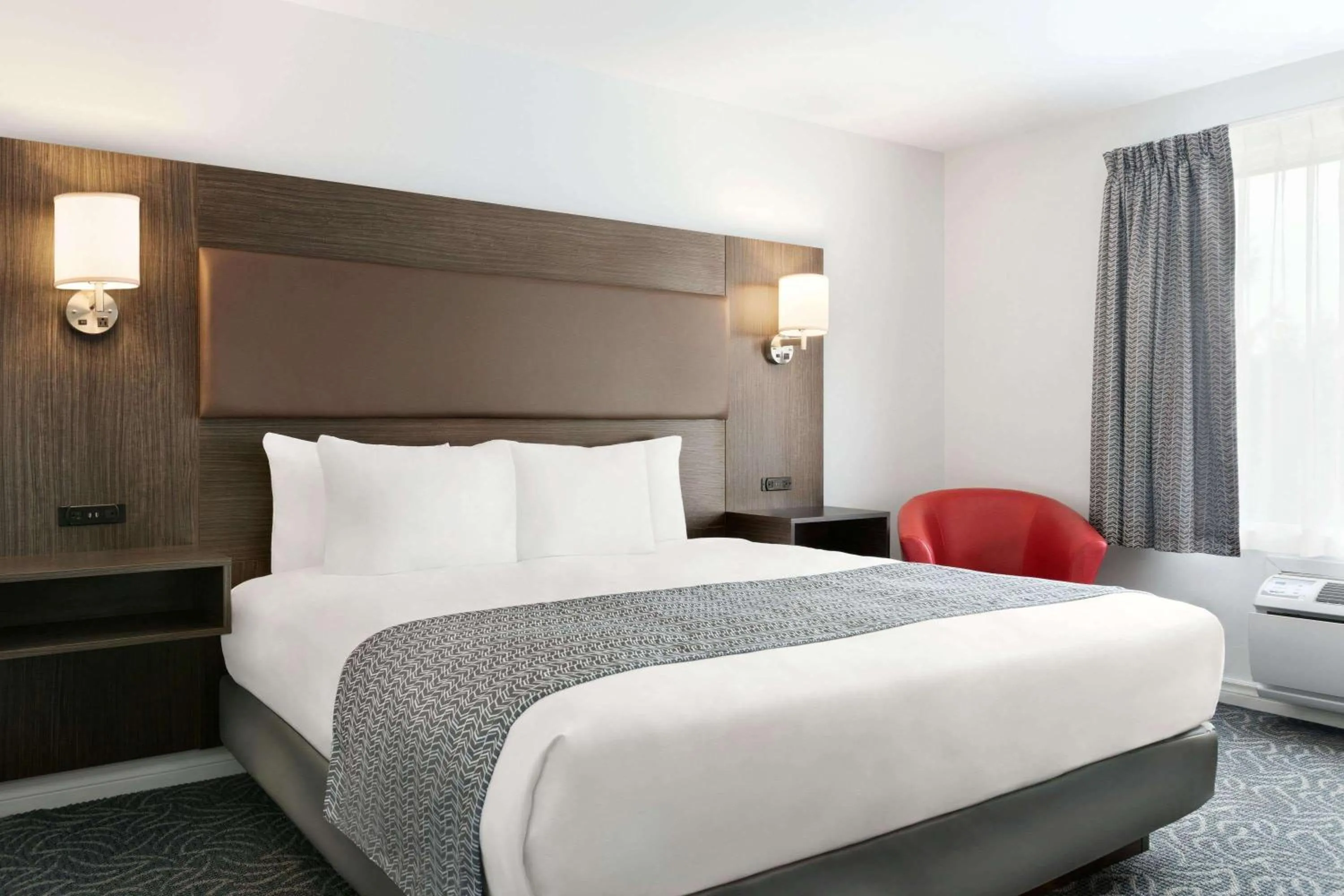 Photo of the whole room, Bed in Travelodge by Wyndham Rigaud