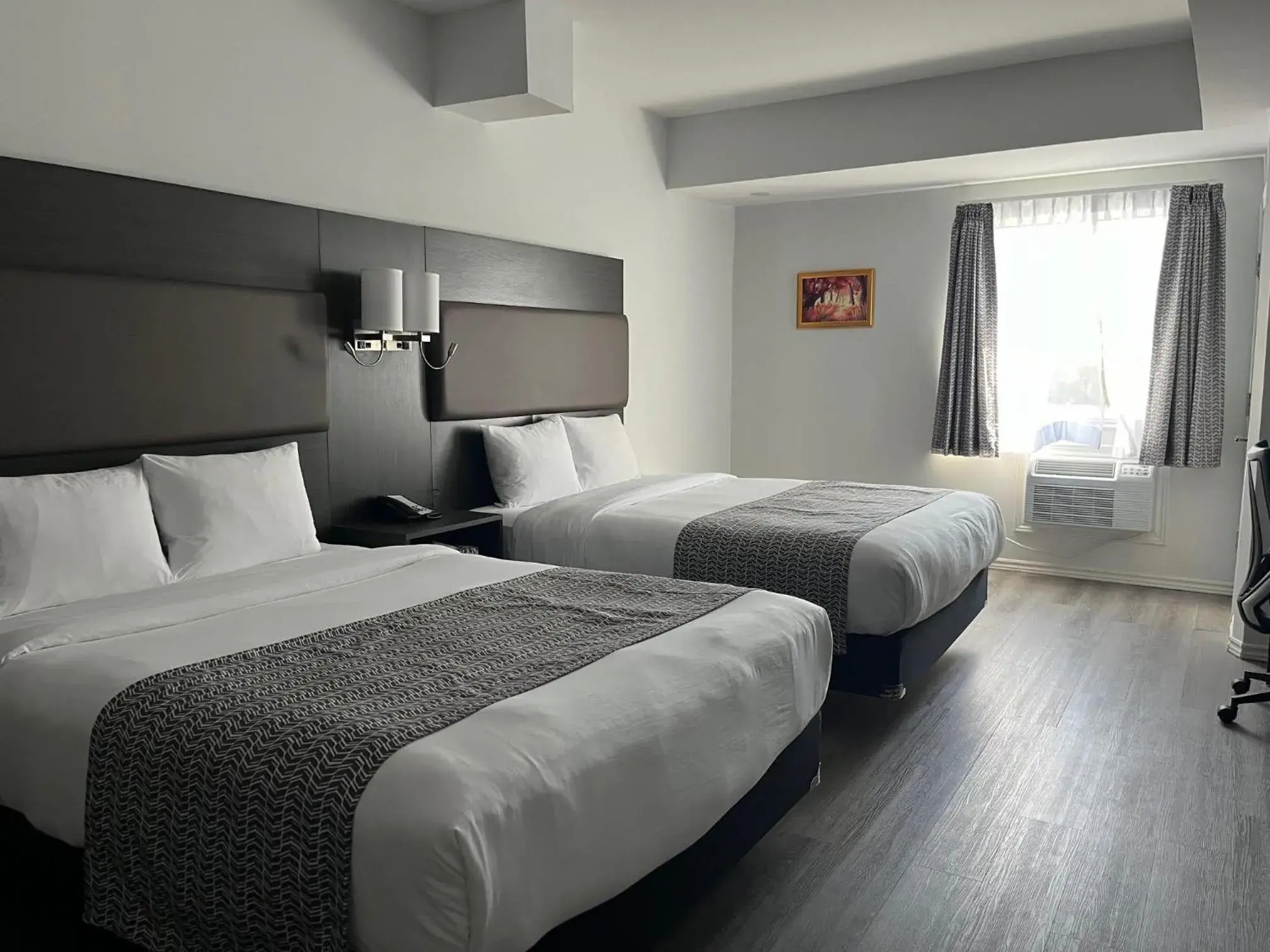 Bed in Travelodge by Wyndham Rigaud Bed in Travelodge by Wyndham Rigaud