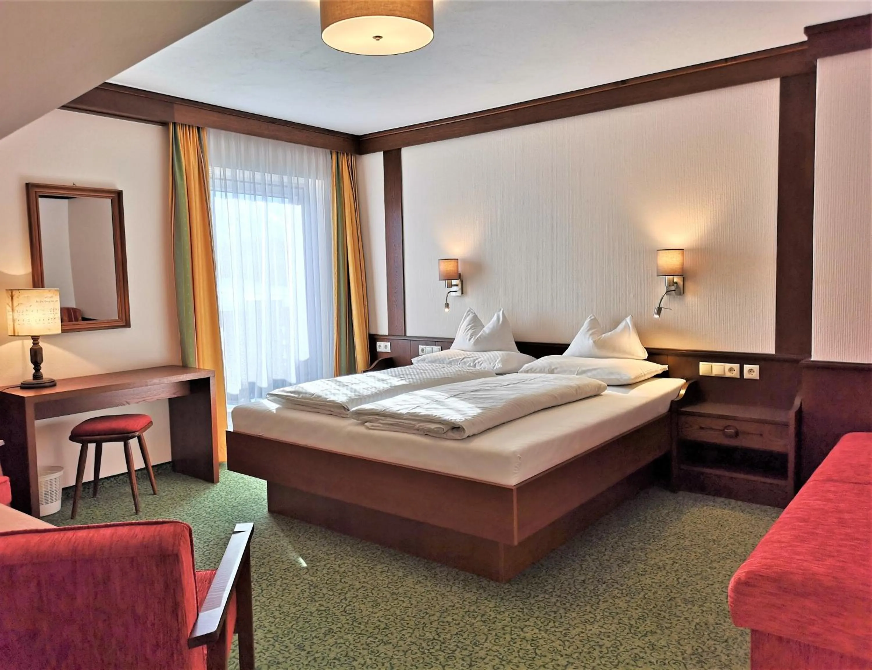 Bed in Hotel Stockerwirt