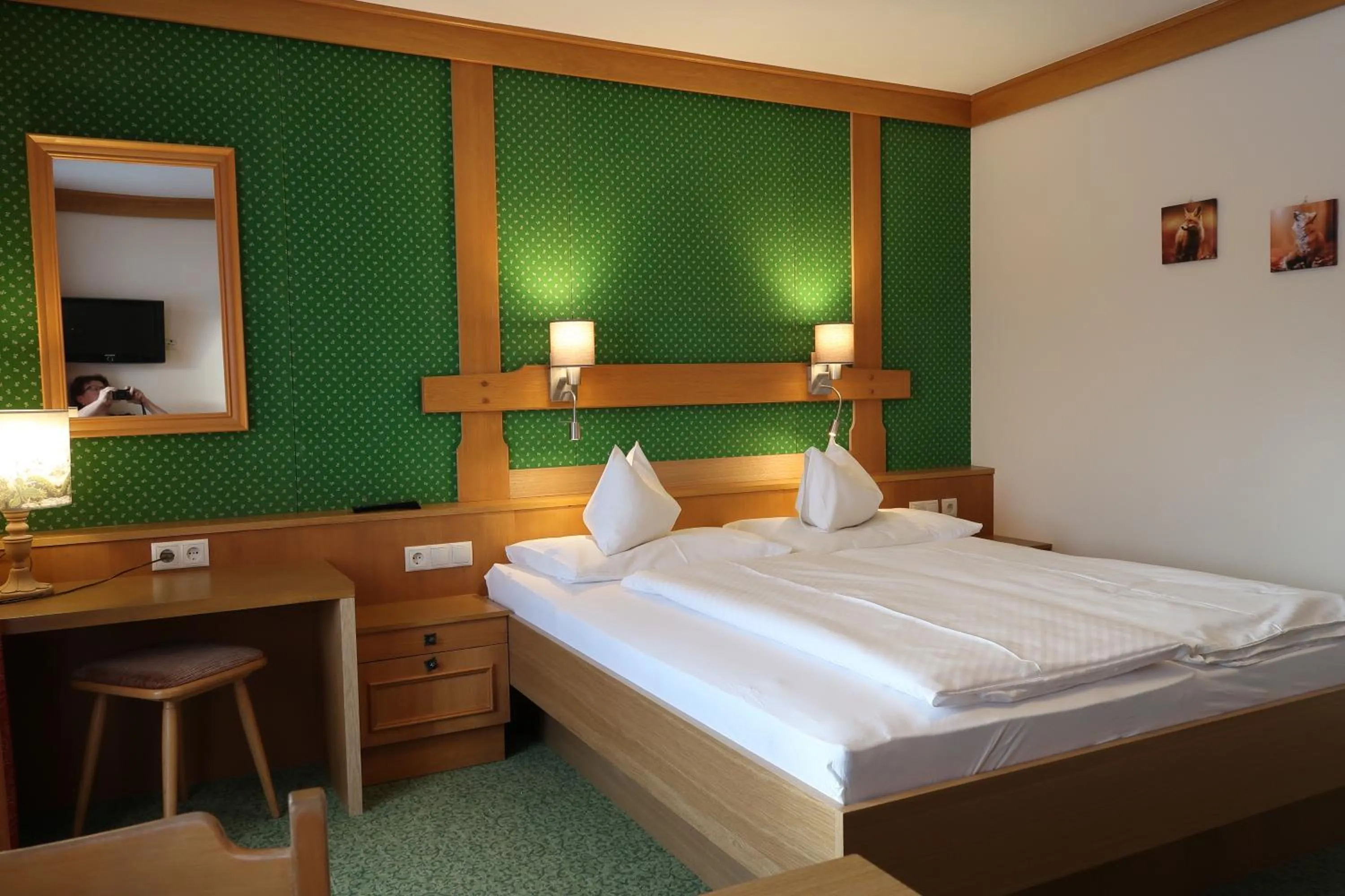 Bed in Hotel Stockerwirt