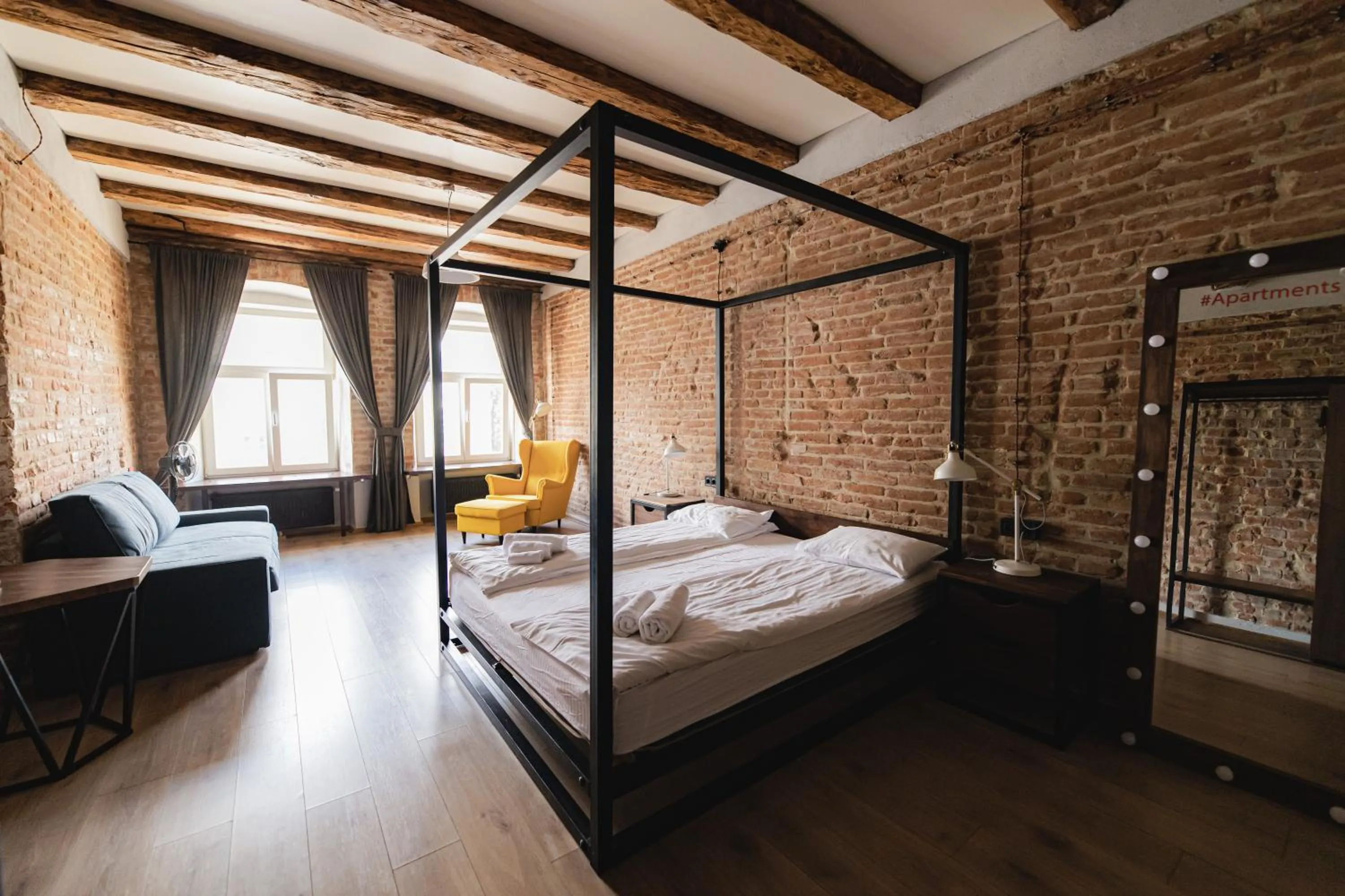 Bed in Apartments JustLvivIt at the Rynok Square