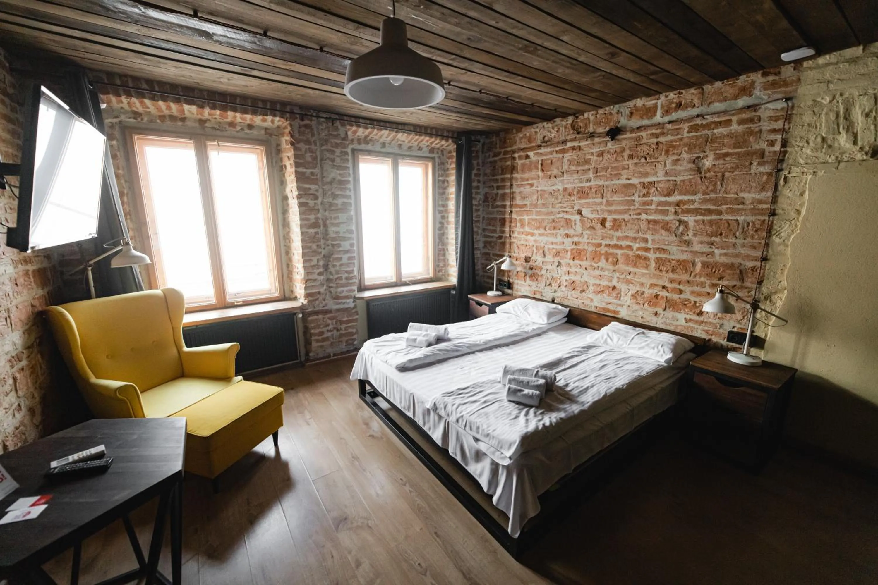 Bed in Apartments JustLvivIt at the Rynok Square