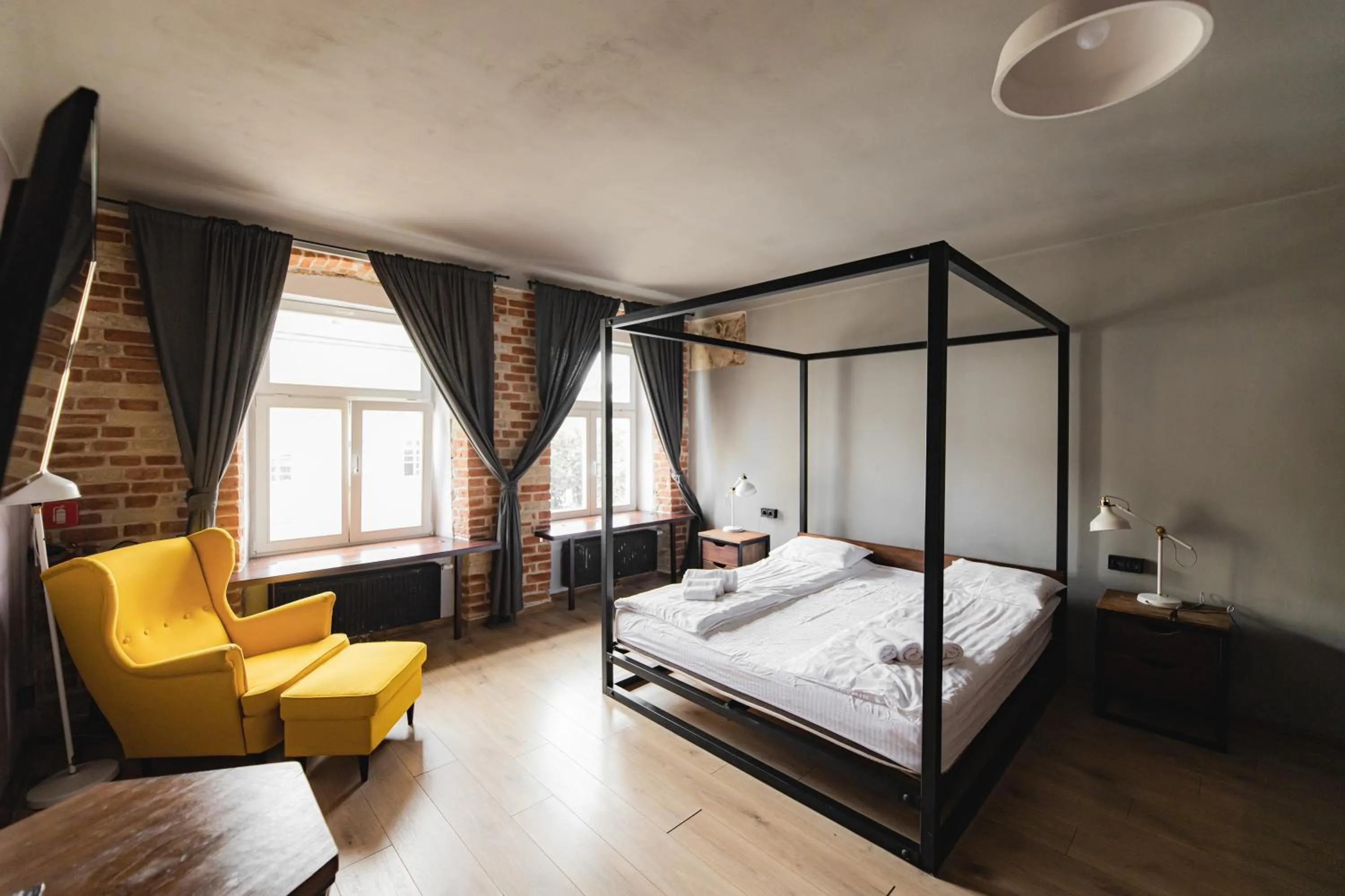 Bed in Apartments JustLvivIt at the Rynok Square