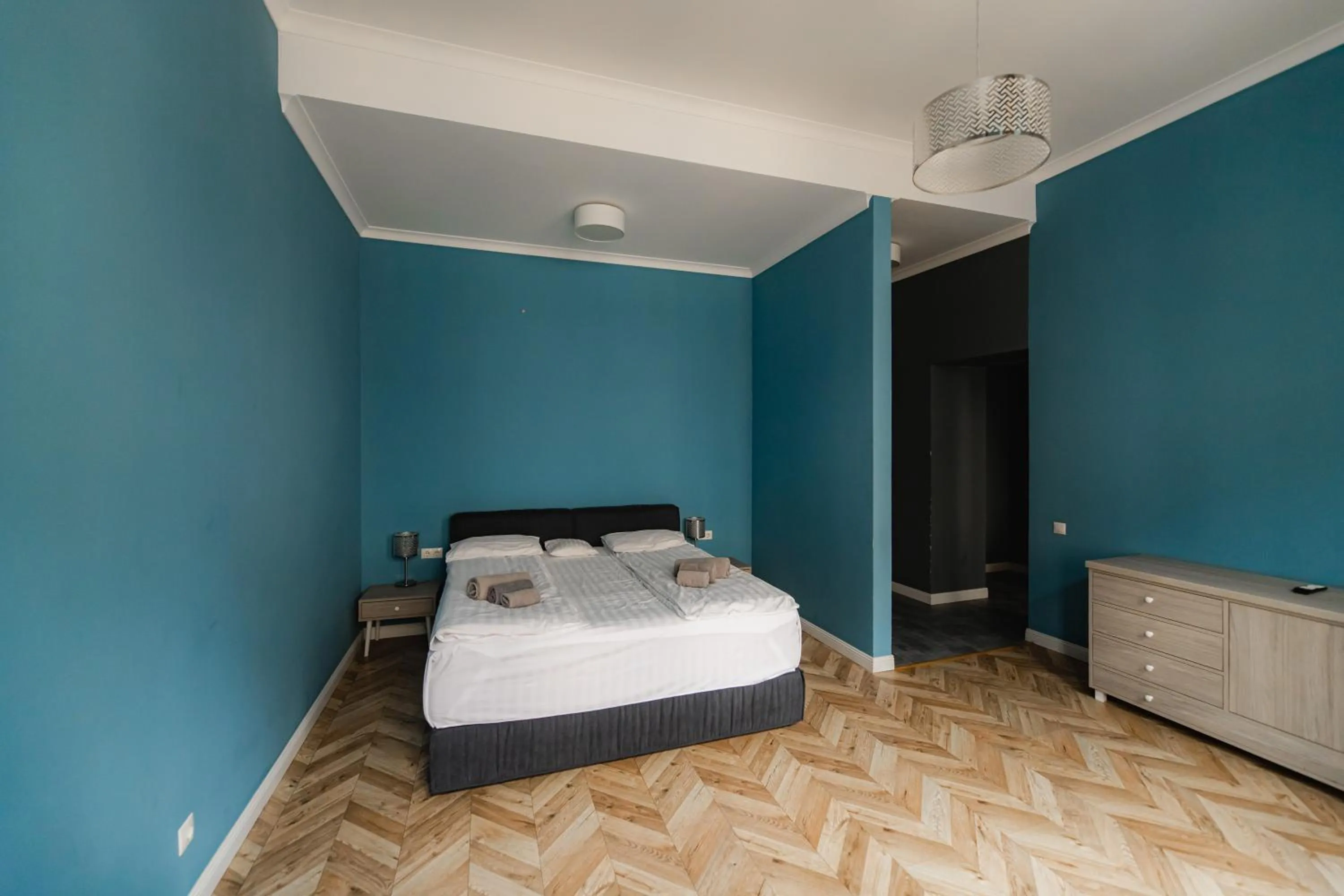 Bed in Apartments JustLvivIt at the Rynok Square