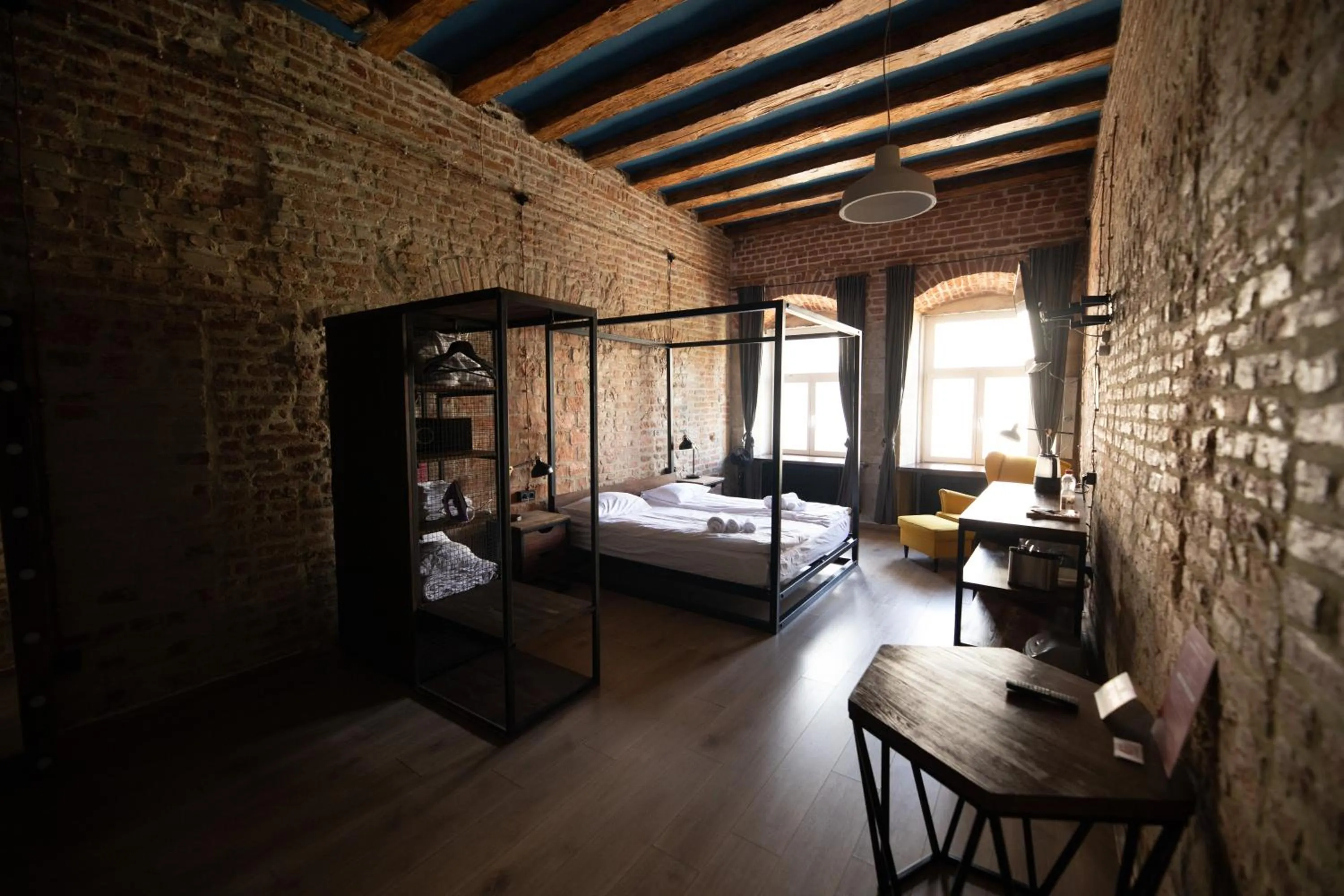 Bed in Apartments JustLvivIt at the Rynok Square