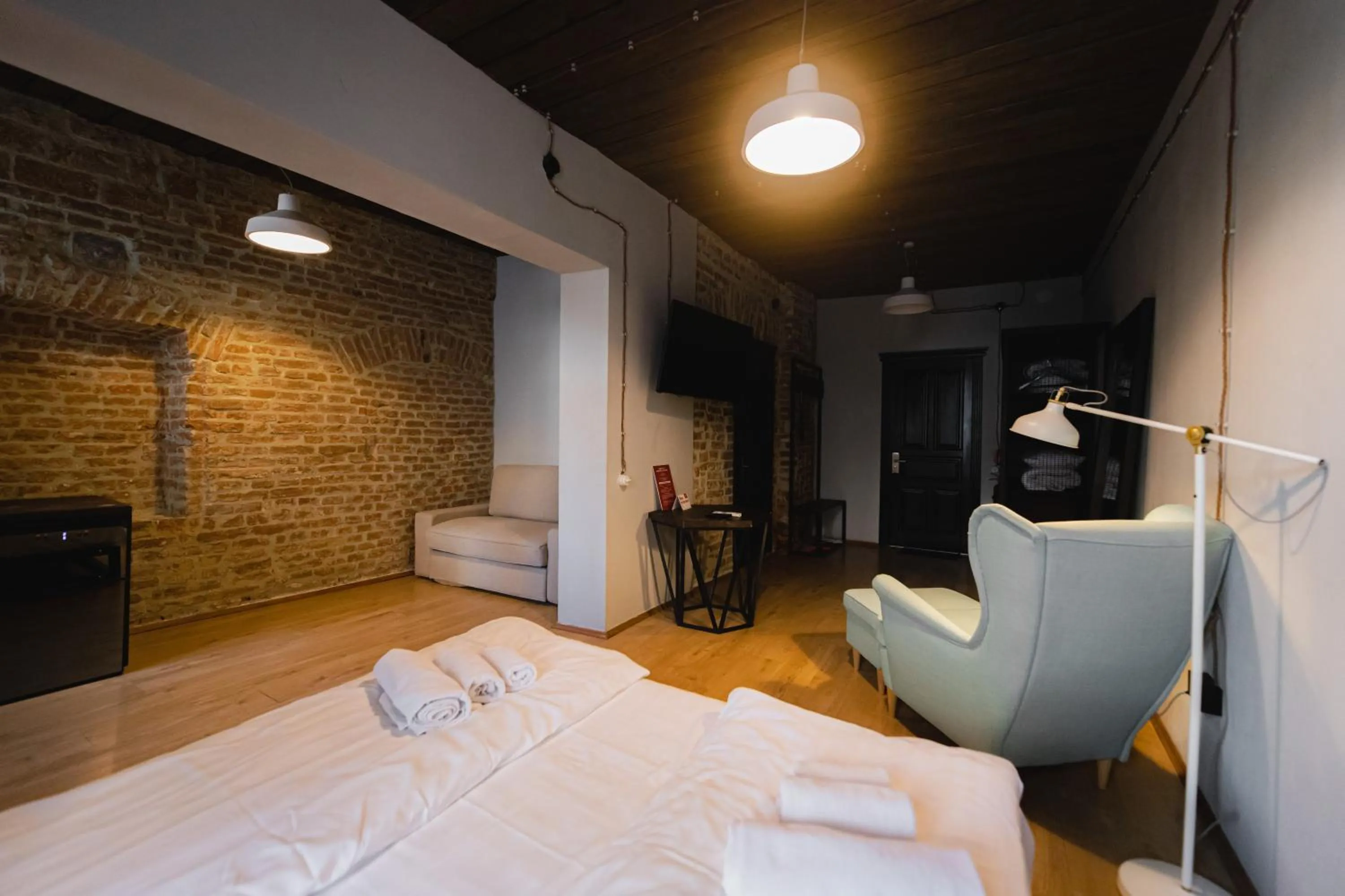 Bed in Apartments JustLvivIt at the Rynok Square