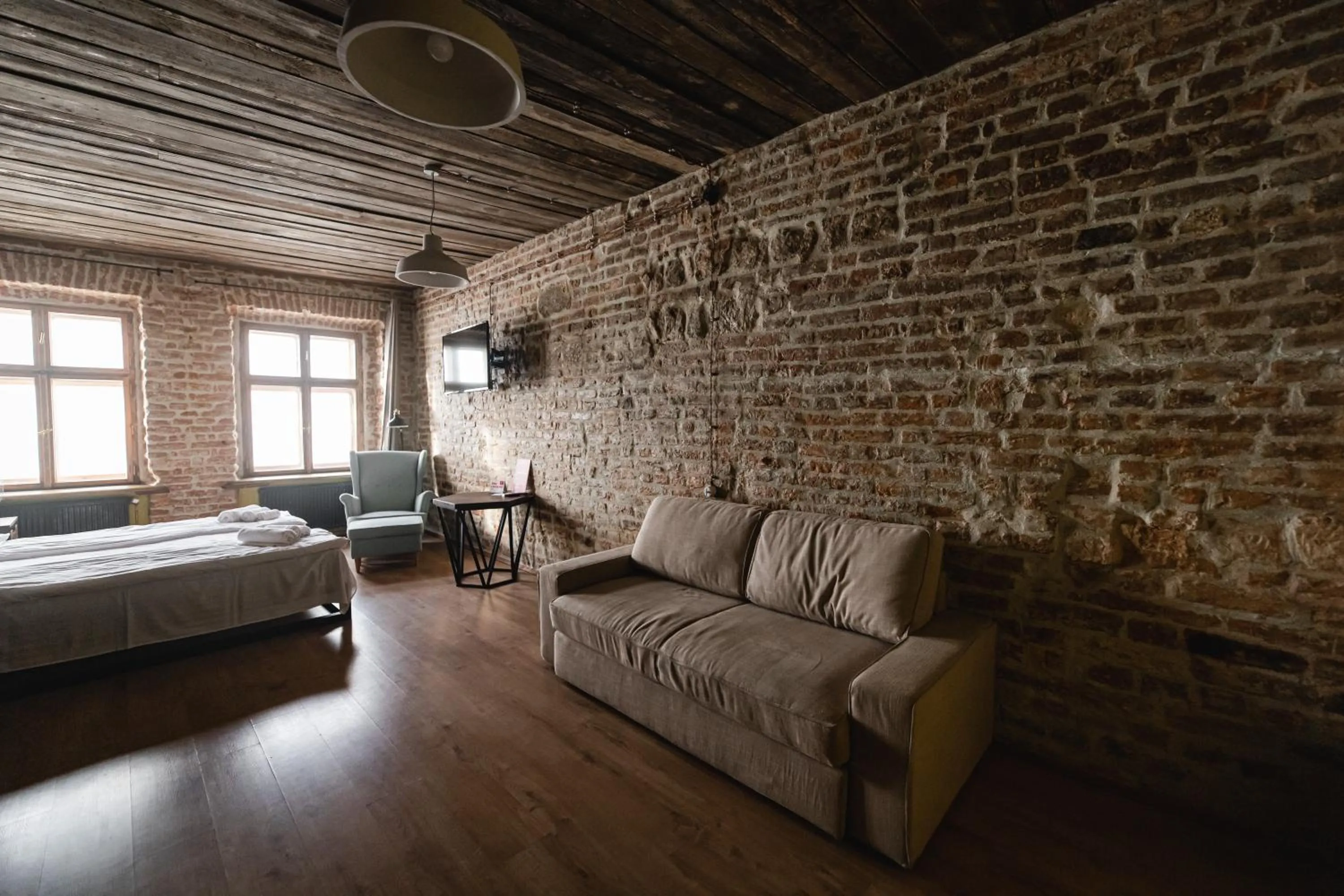 Bed in Apartments JustLvivIt at the Rynok Square