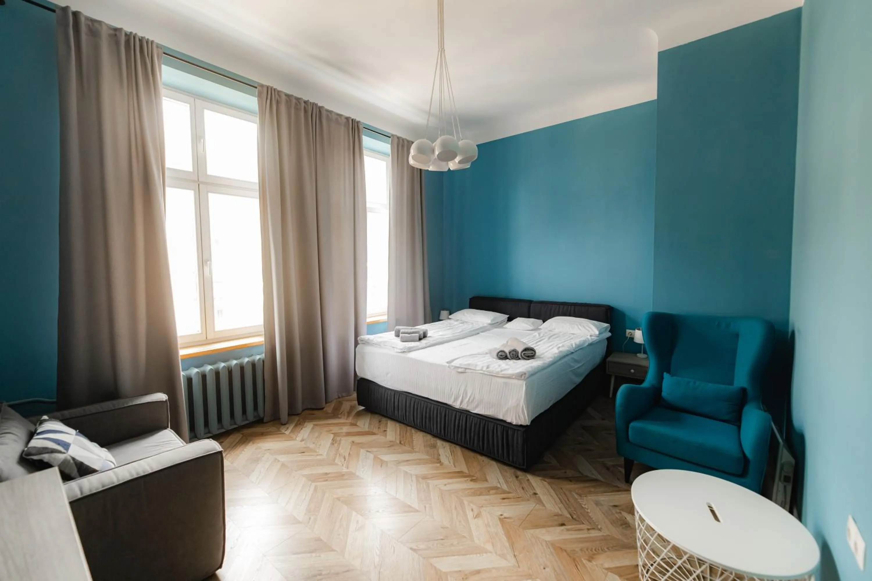 Bed in Apartments JustLvivIt at the Rynok Square