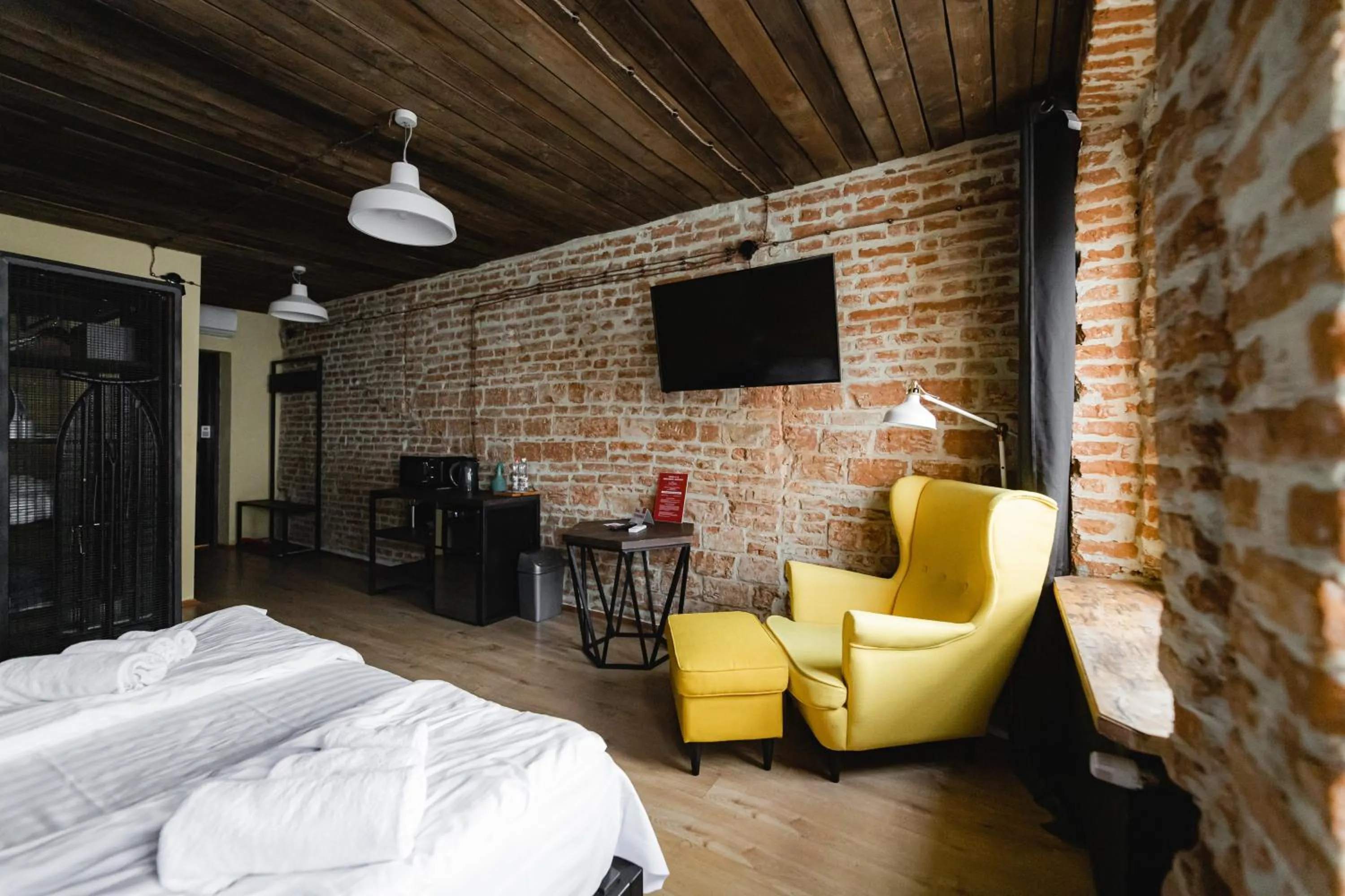 Bed in Apartments JustLvivIt at the Rynok Square