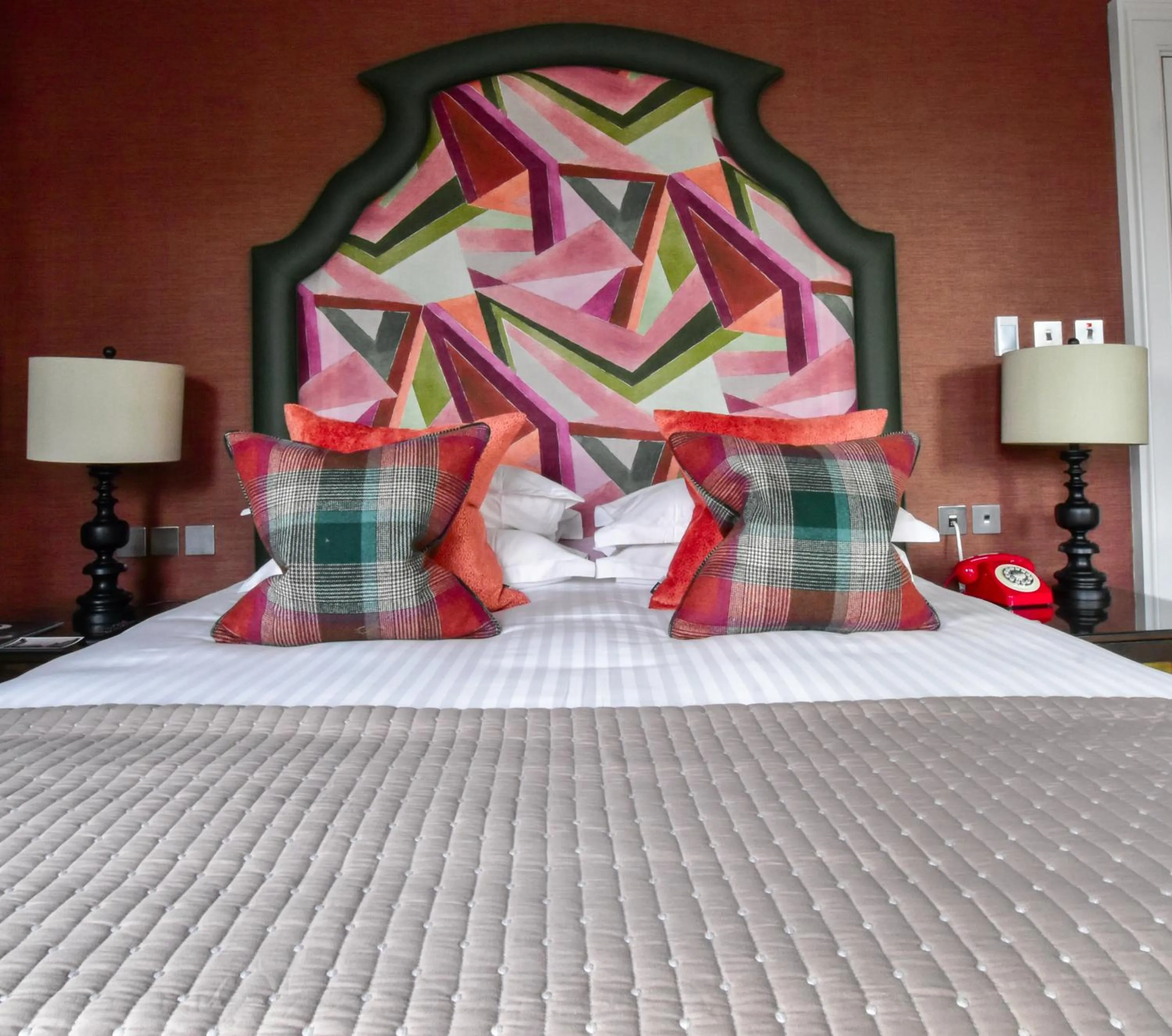 Bed in The Rutland Hotel & Apartments