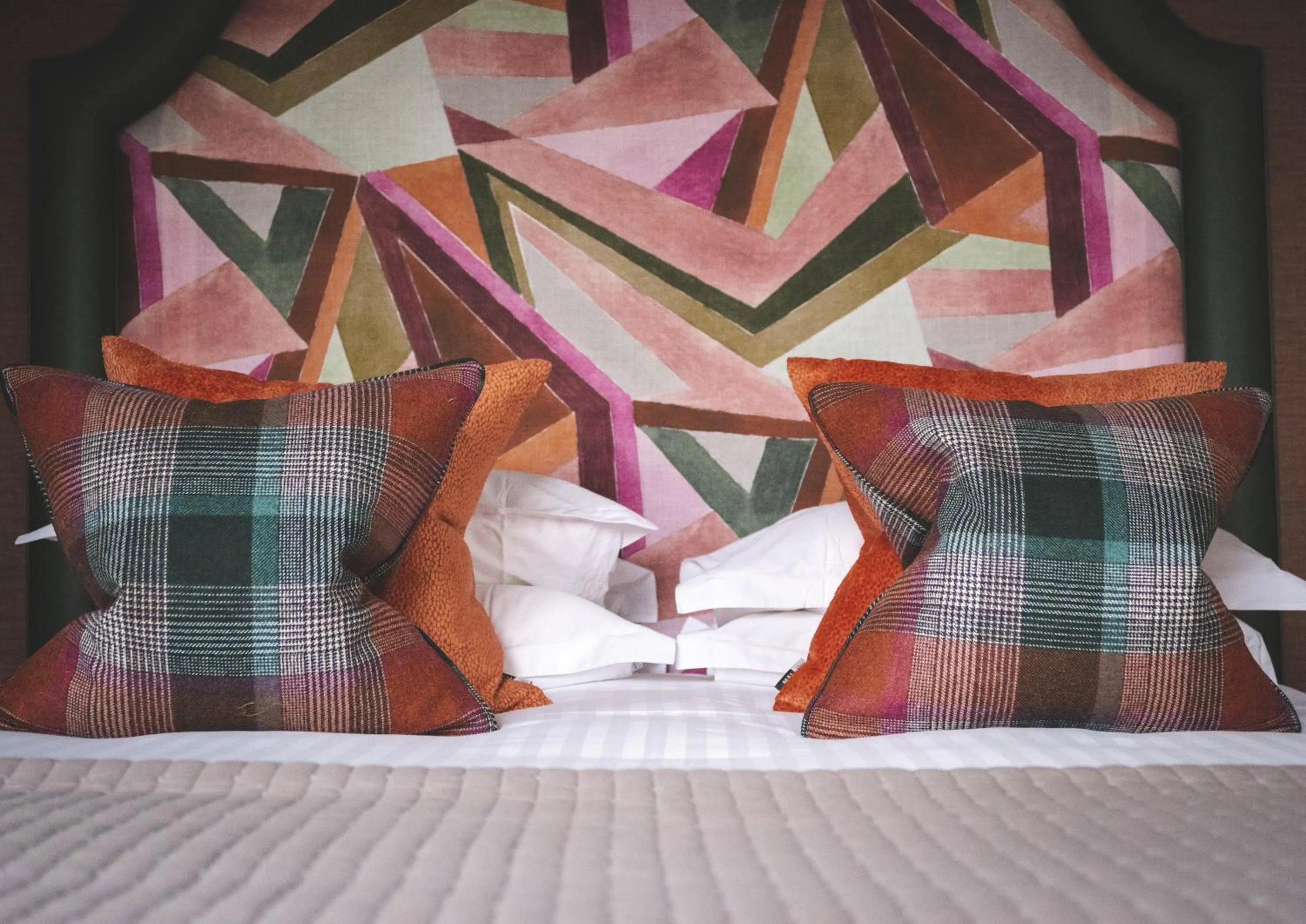 Bed in The Rutland Hotel & Apartments