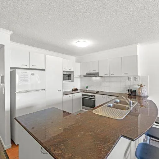 kitchen in The Mirage Resort Alexandra Headland