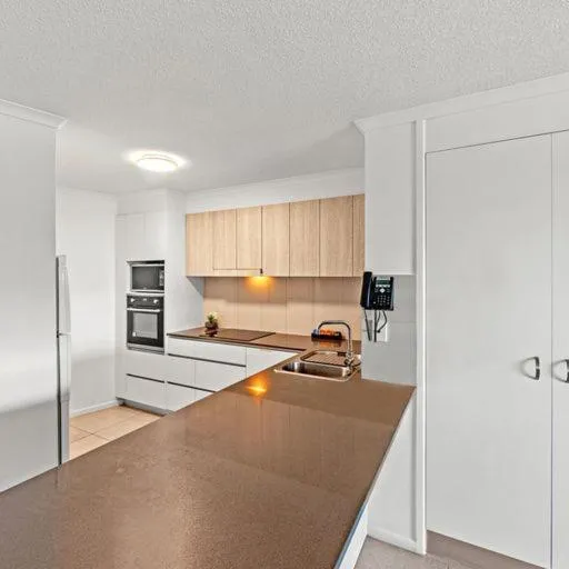 kitchen in The Mirage Resort Alexandra Headland