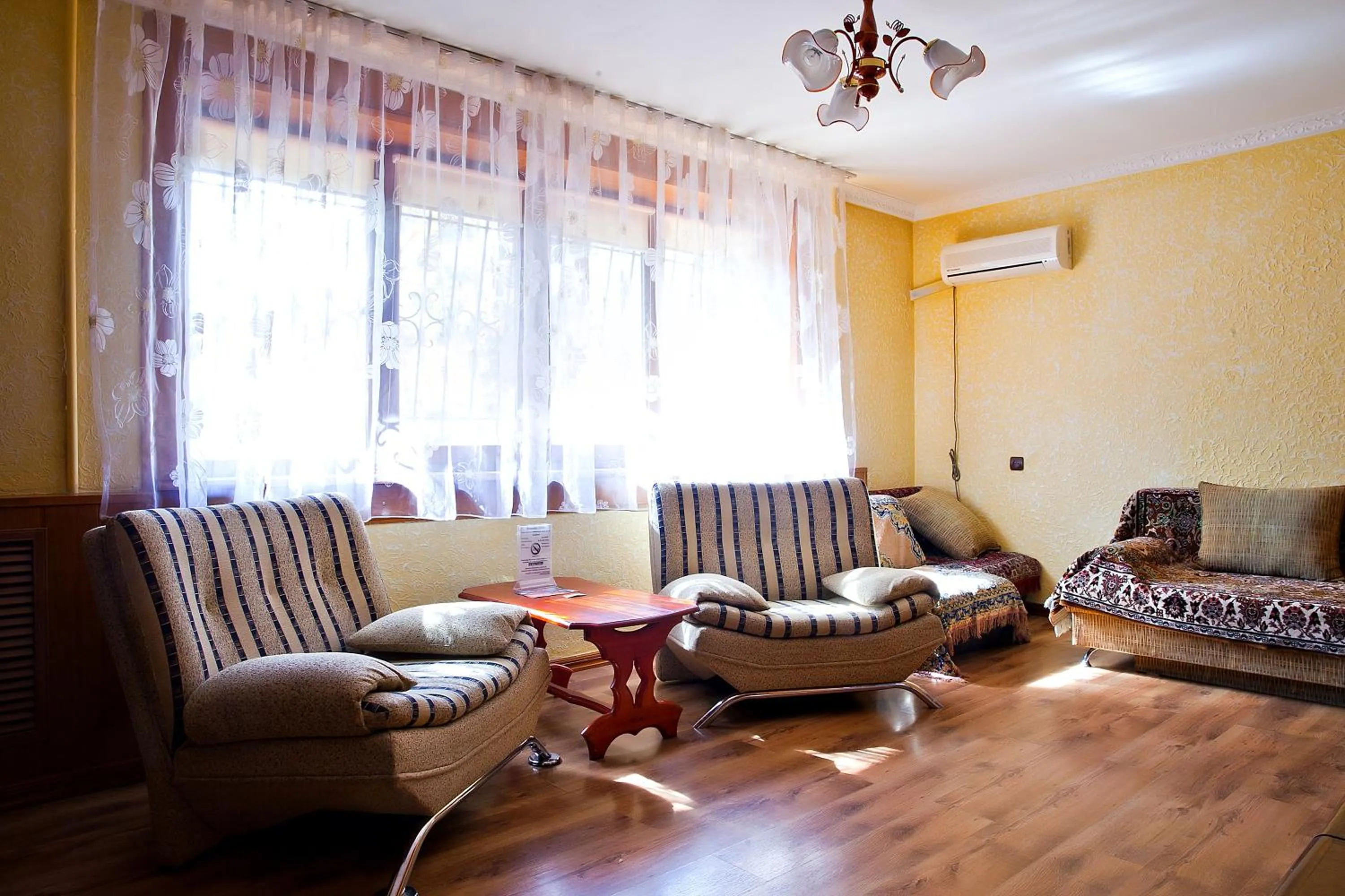 Living room in Lessor Apartments
