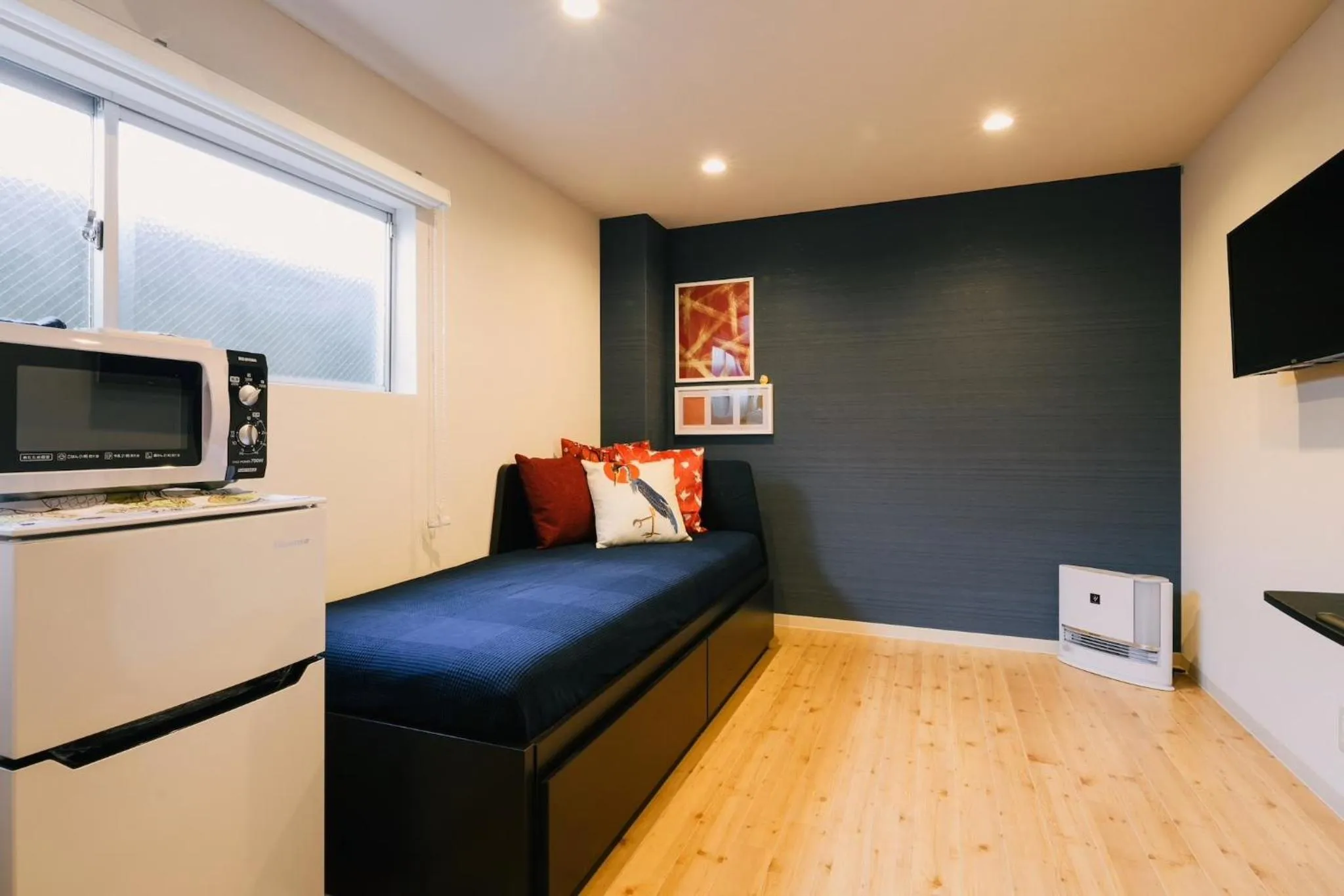 Living room, Bed in TEN APARTMENT HOTEL