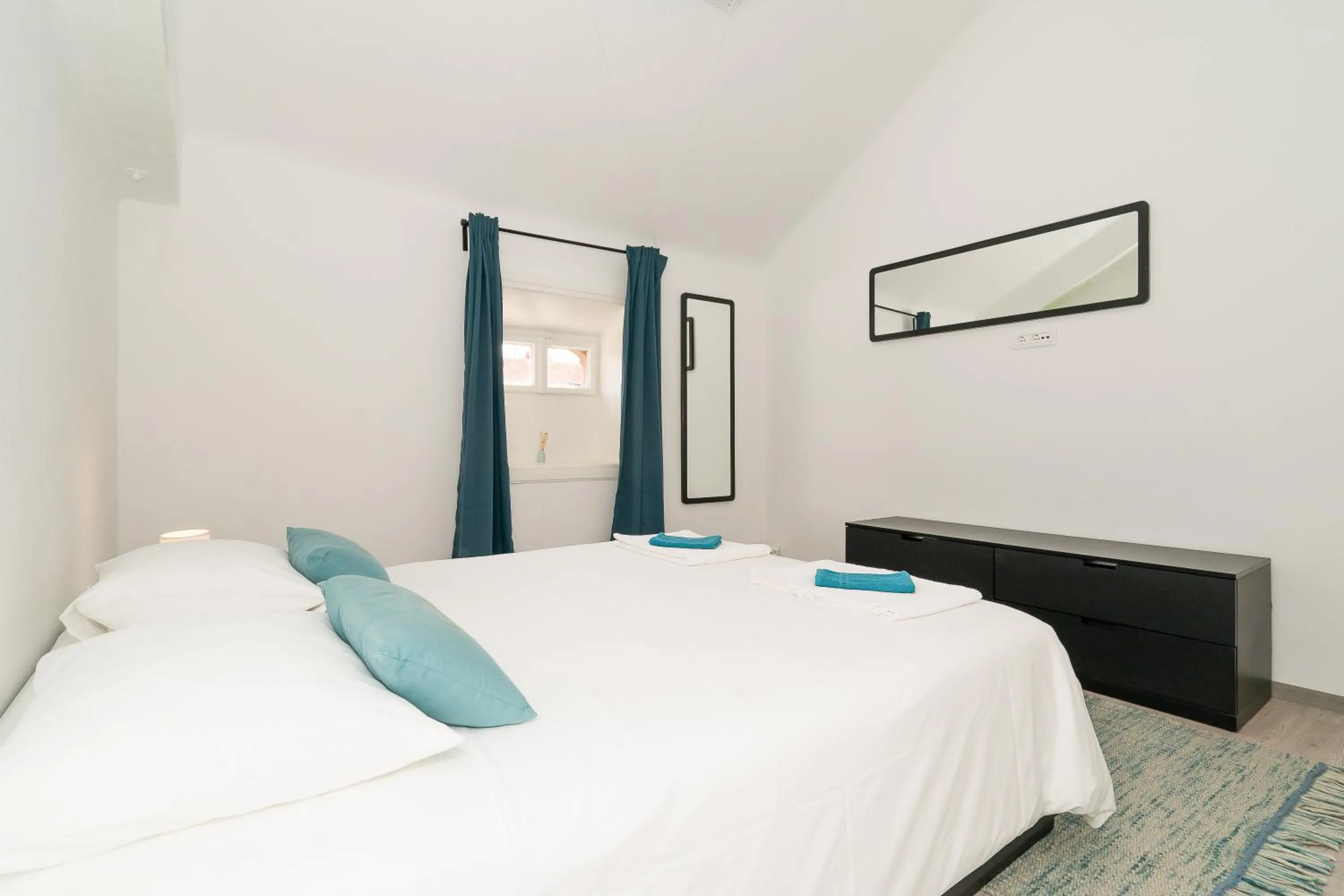 Bed in Loft at Republic Square