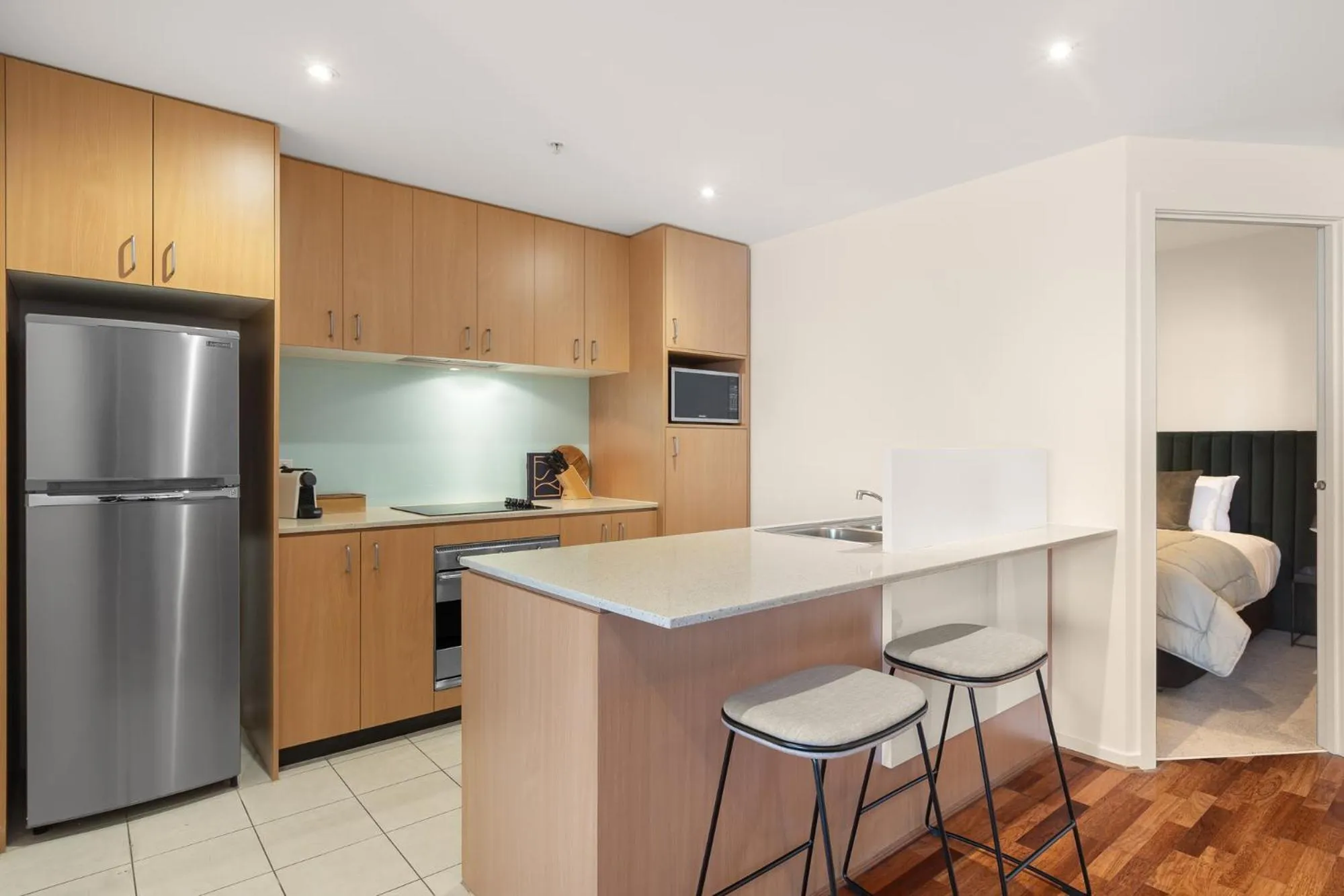 kitchen in Nolo Apartments Lonsdale St