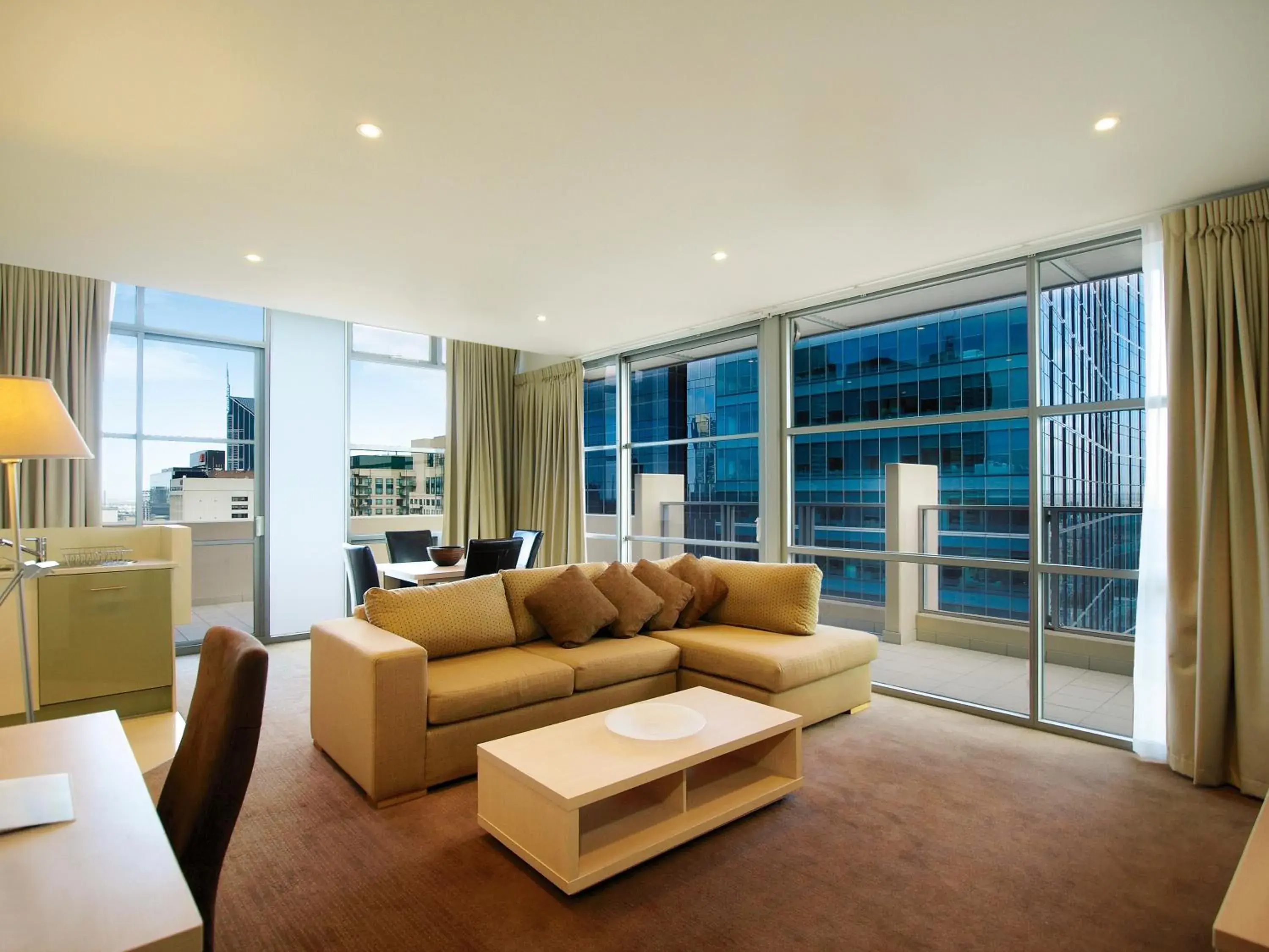 Living room in Oaks Melbourne on Lonsdale Suites Living room in Oaks Melbourne on Lonsdale Suites