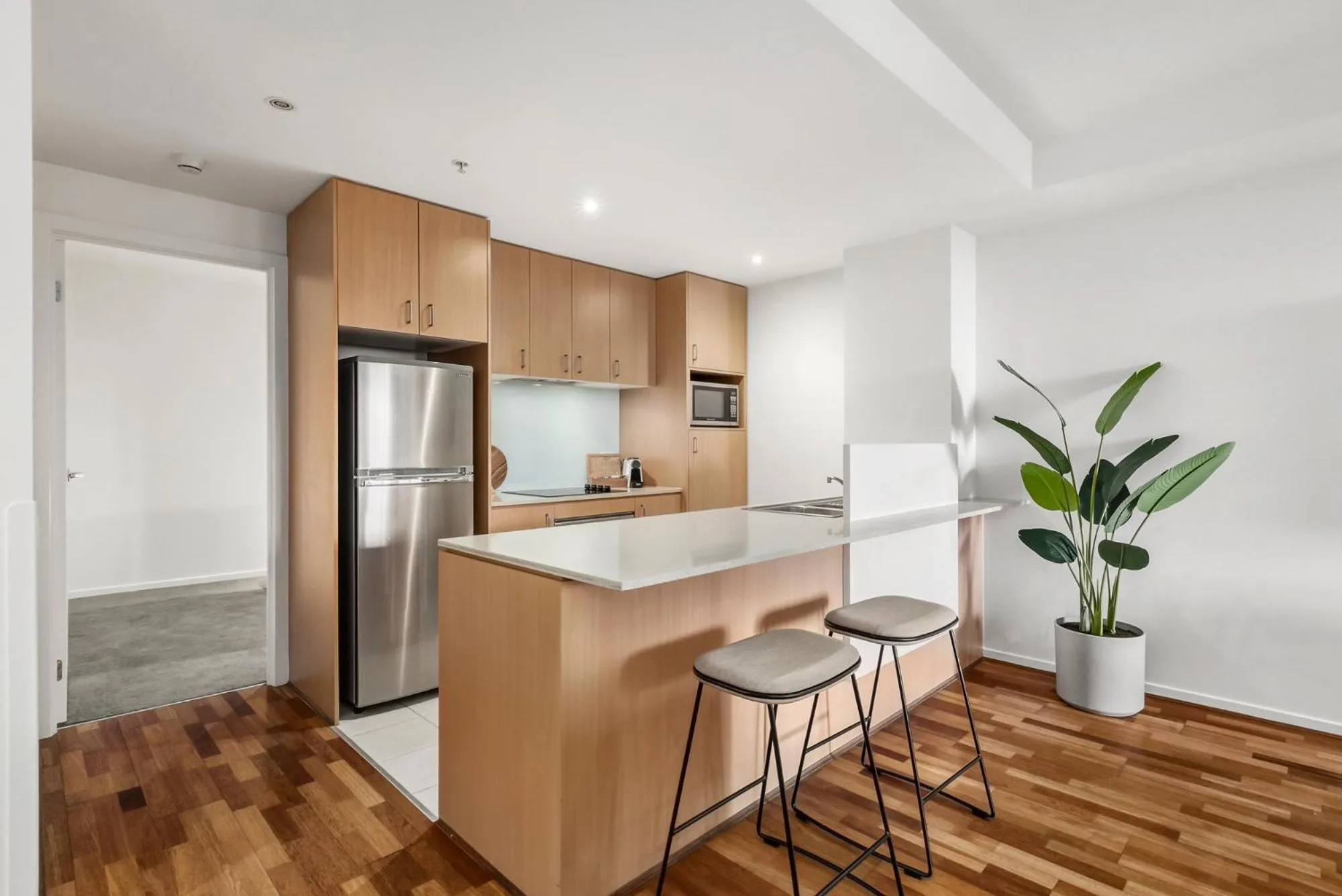 kitchen in Nolo Apartments Lonsdale St