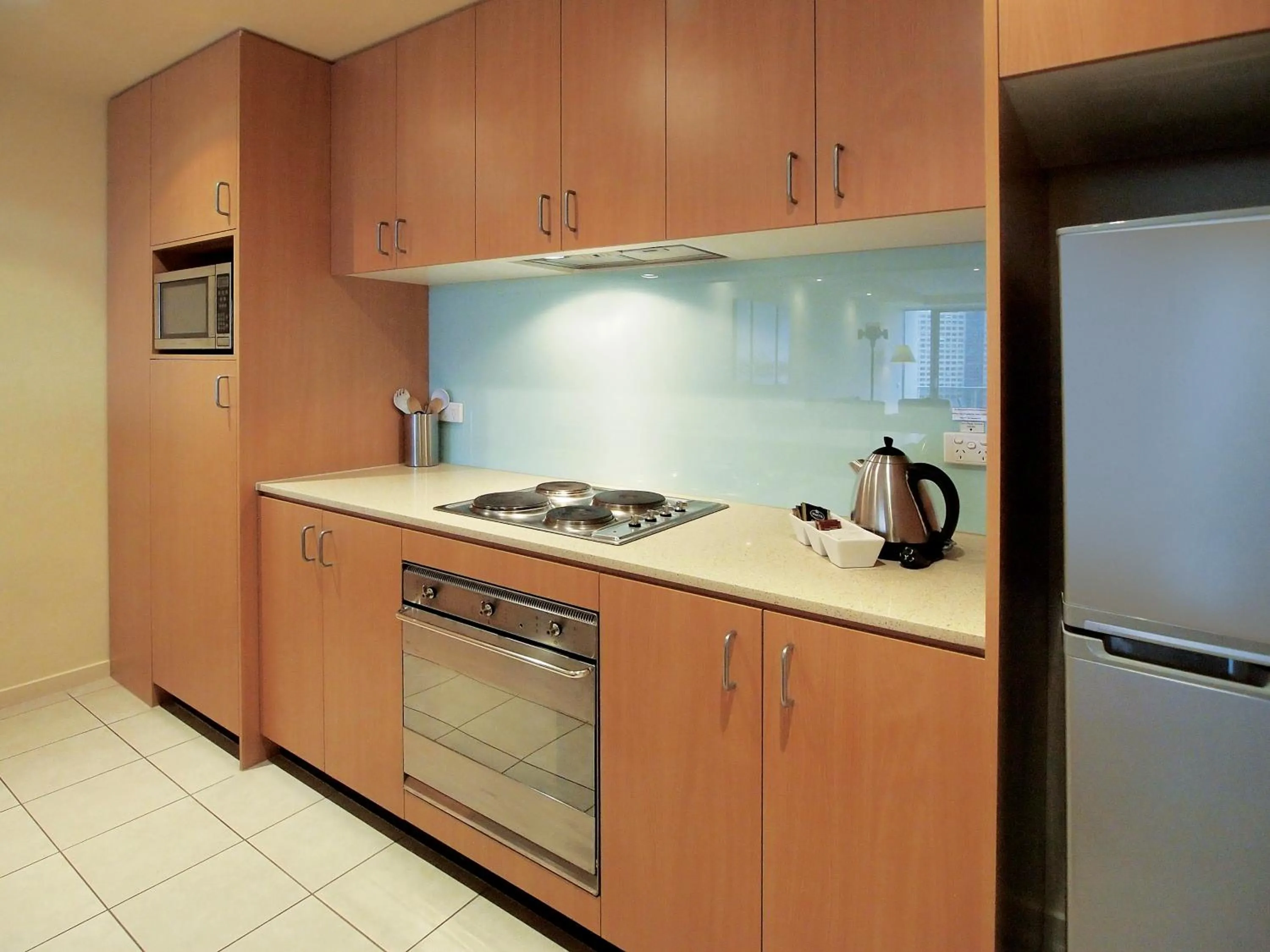 Kitchen or kitchenette in Oaks Melbourne on Lonsdale Suites
