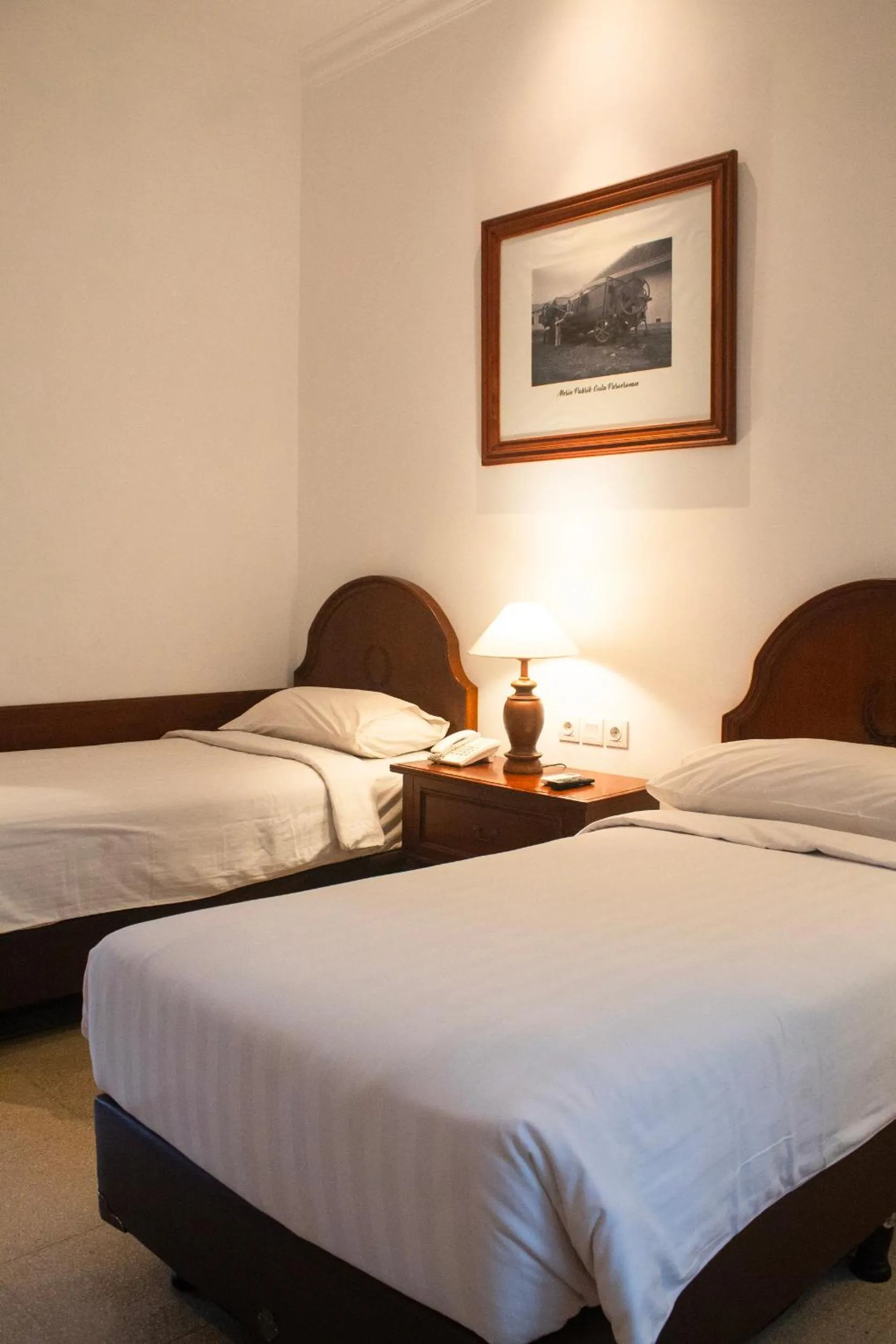 Bed in Daroessalam Syariah Heritage Hotel