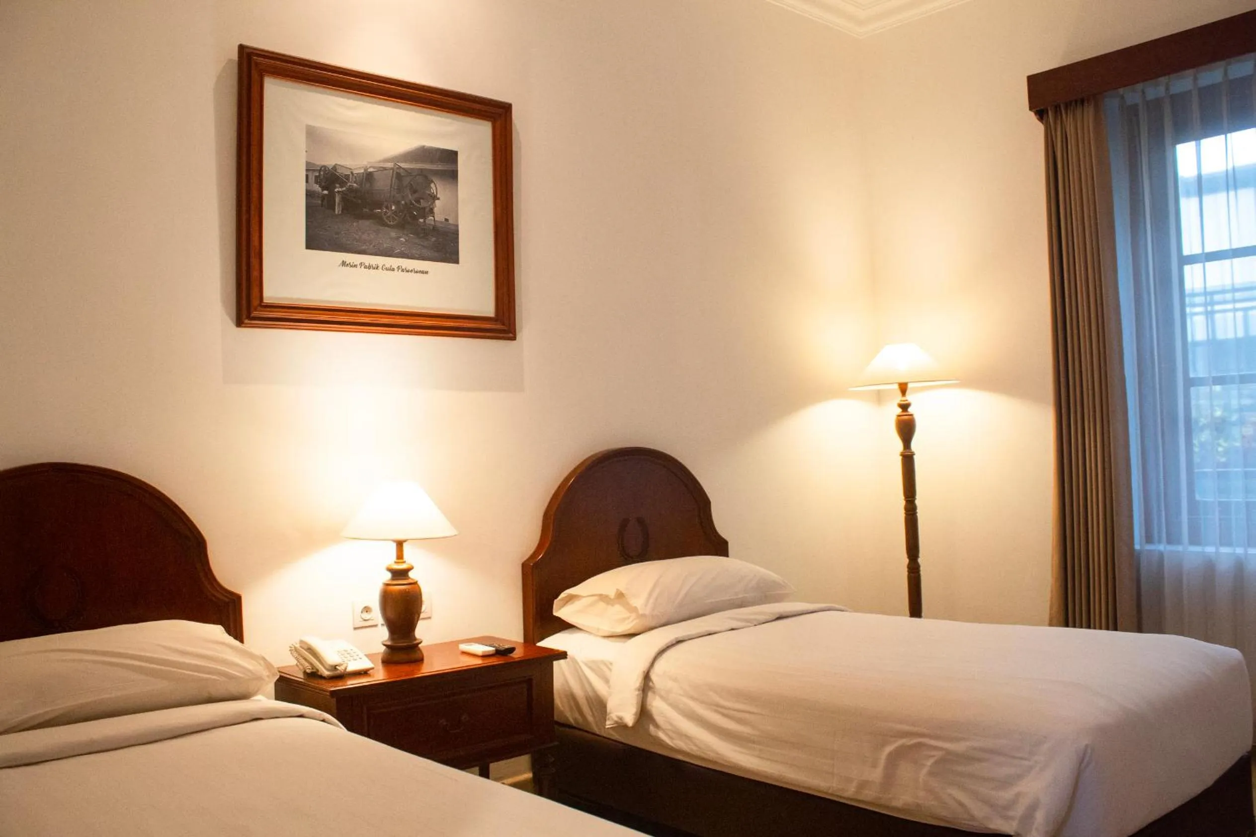 Bed in Daroessalam Syariah Heritage Hotel