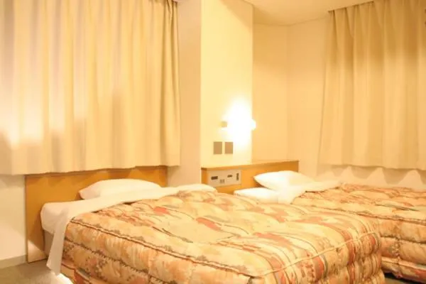 Bed in Hotel Estacion Hikone